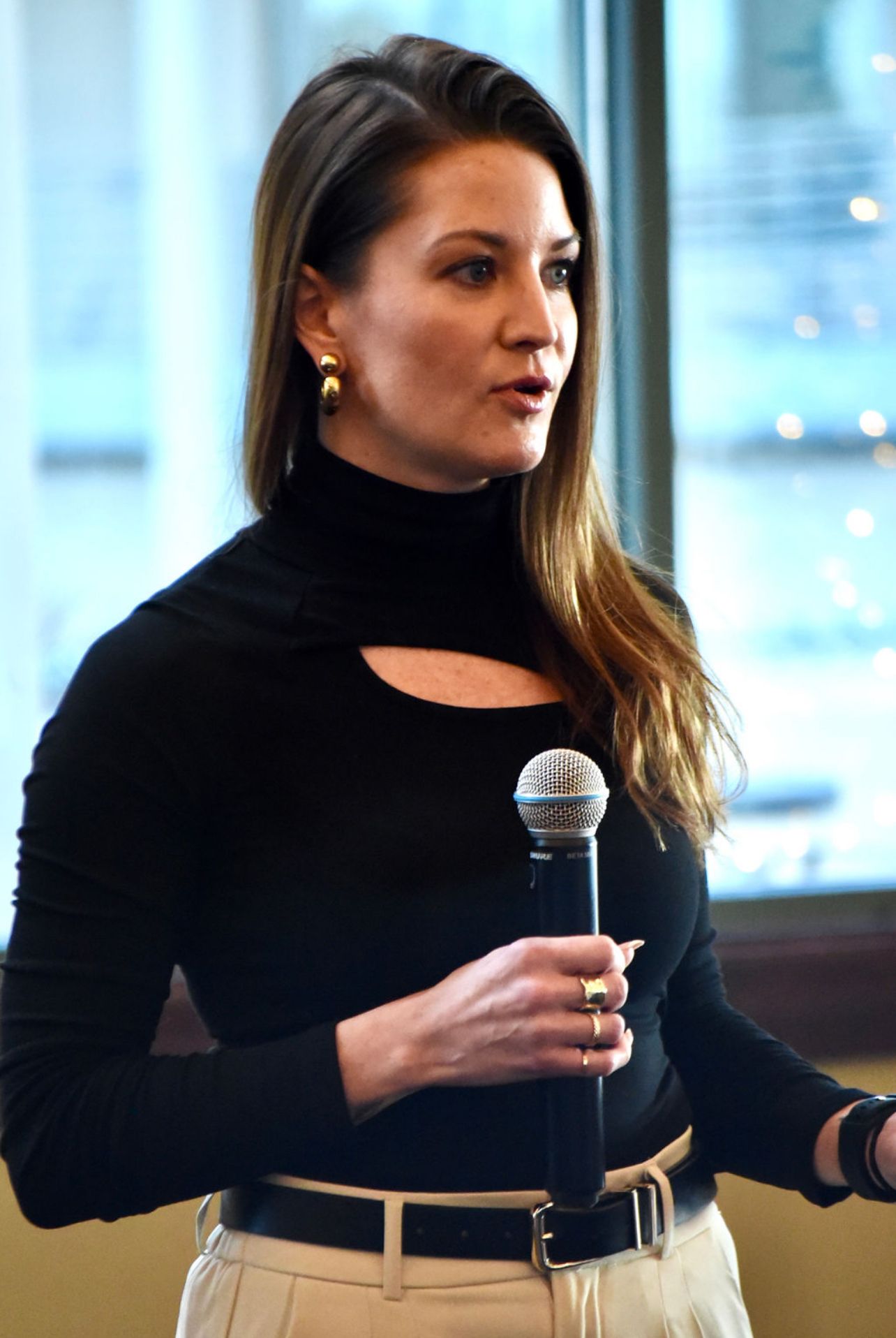 Professional Woman Speaking at Public Event