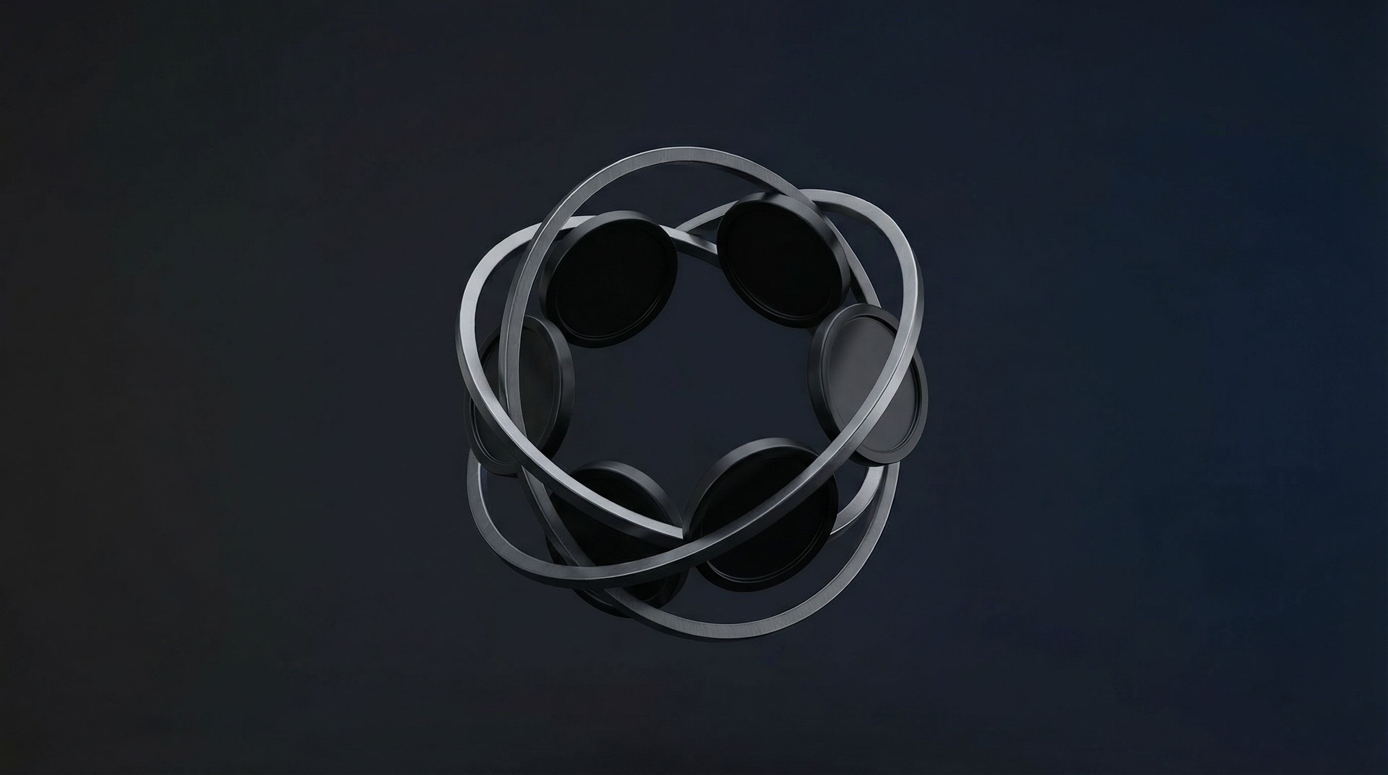 Abstract metallic rings on dark background