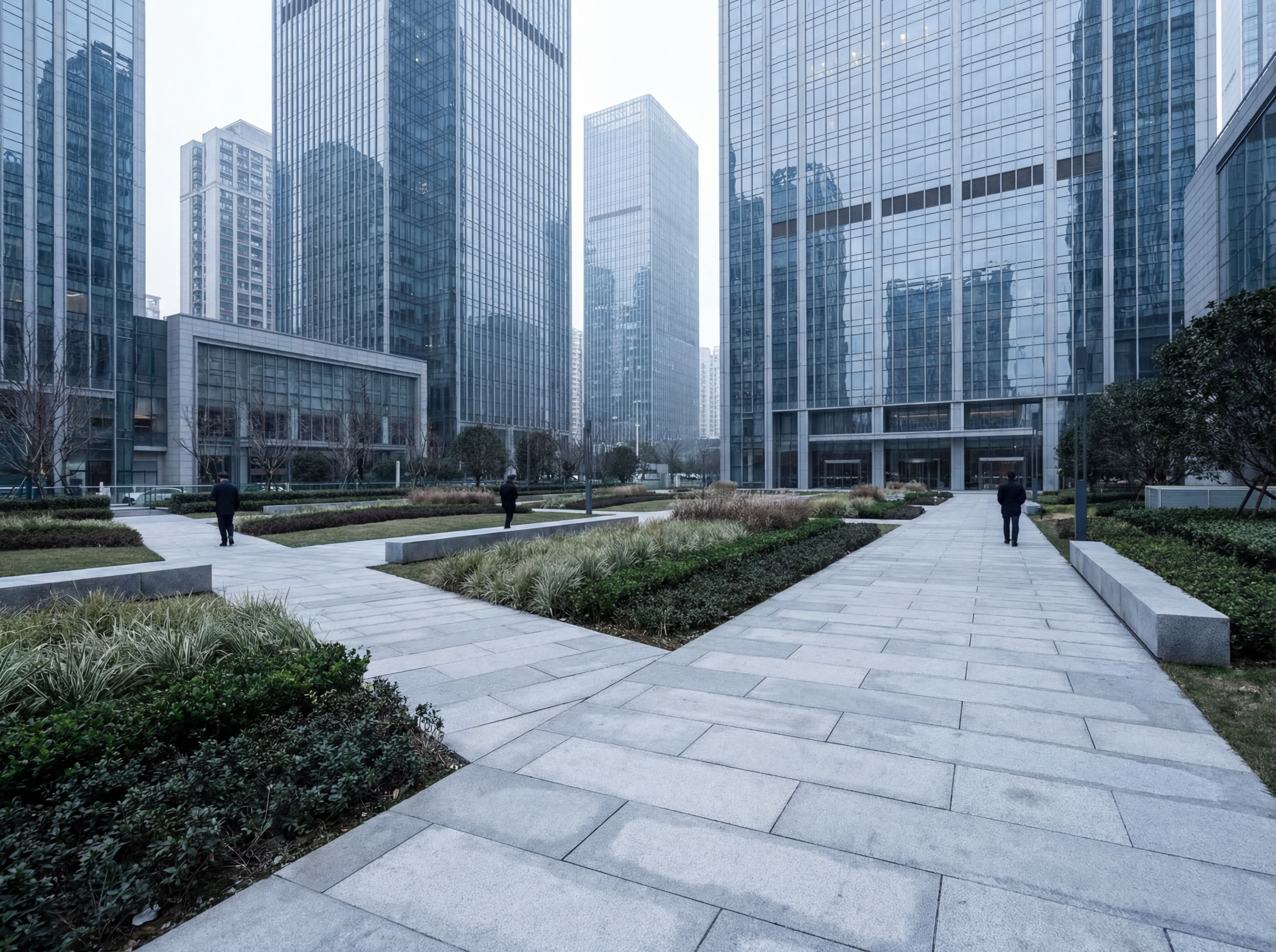 Modern office towers with urban plaza paths