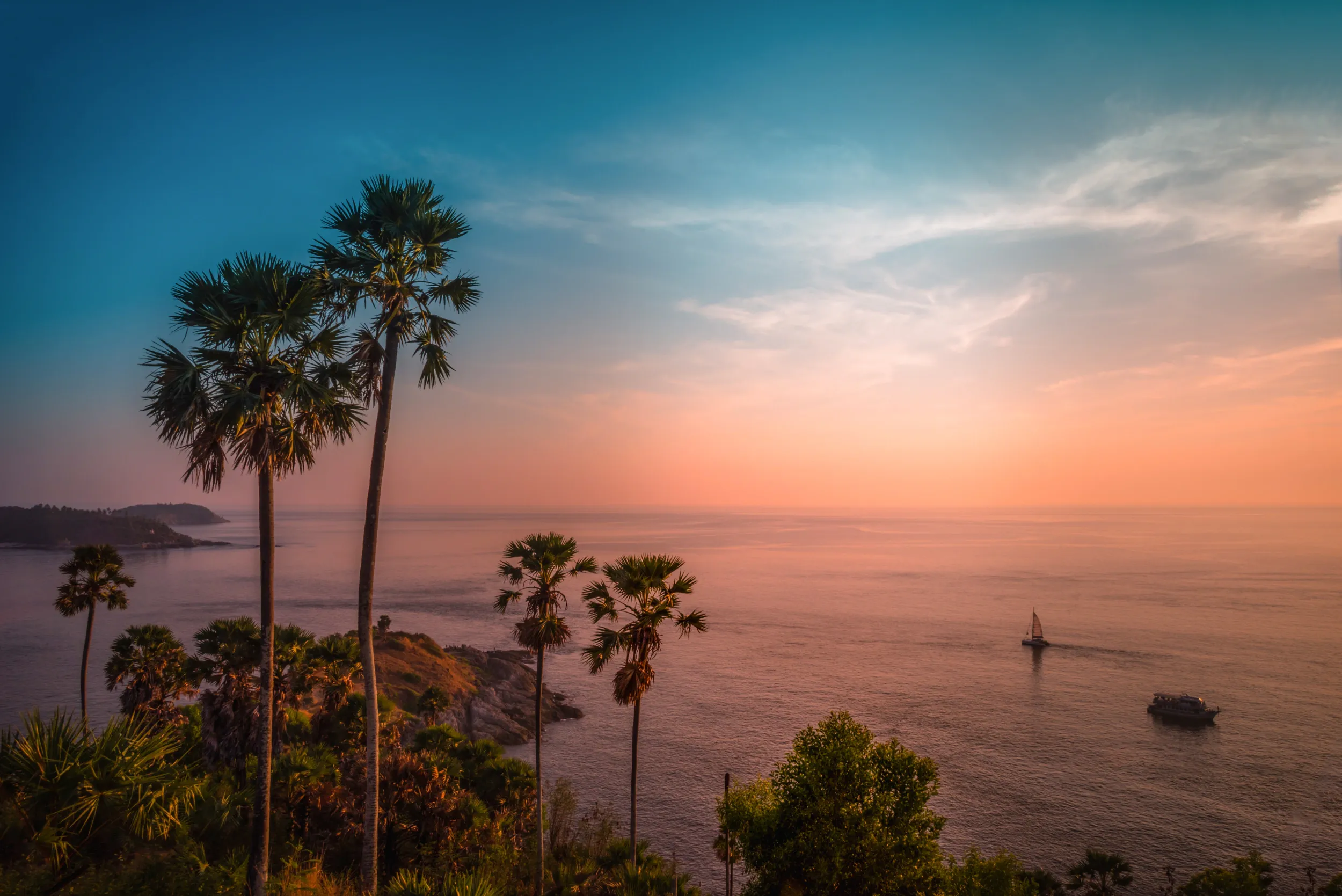 Tropical Sunset Over Ocean with Palm Trees