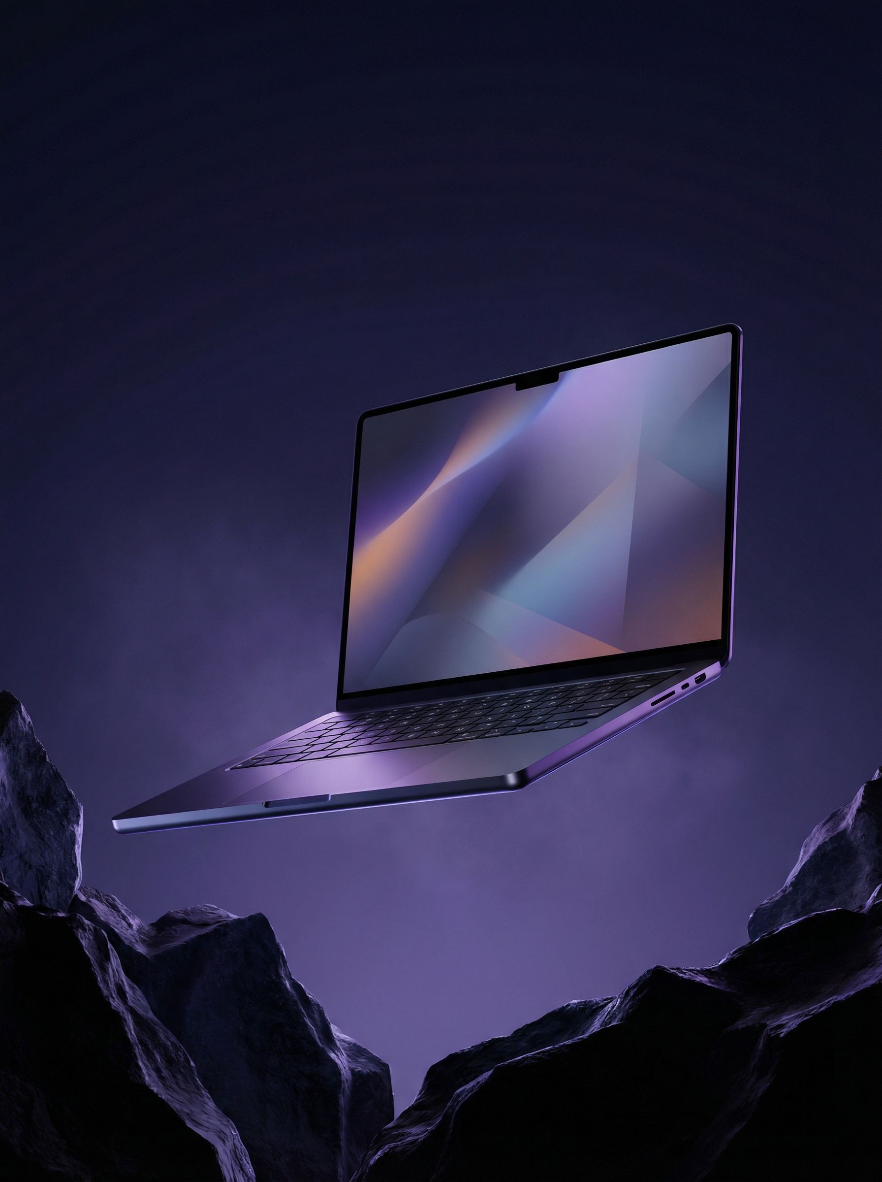 Futuristic laptop floating over rocky landscape