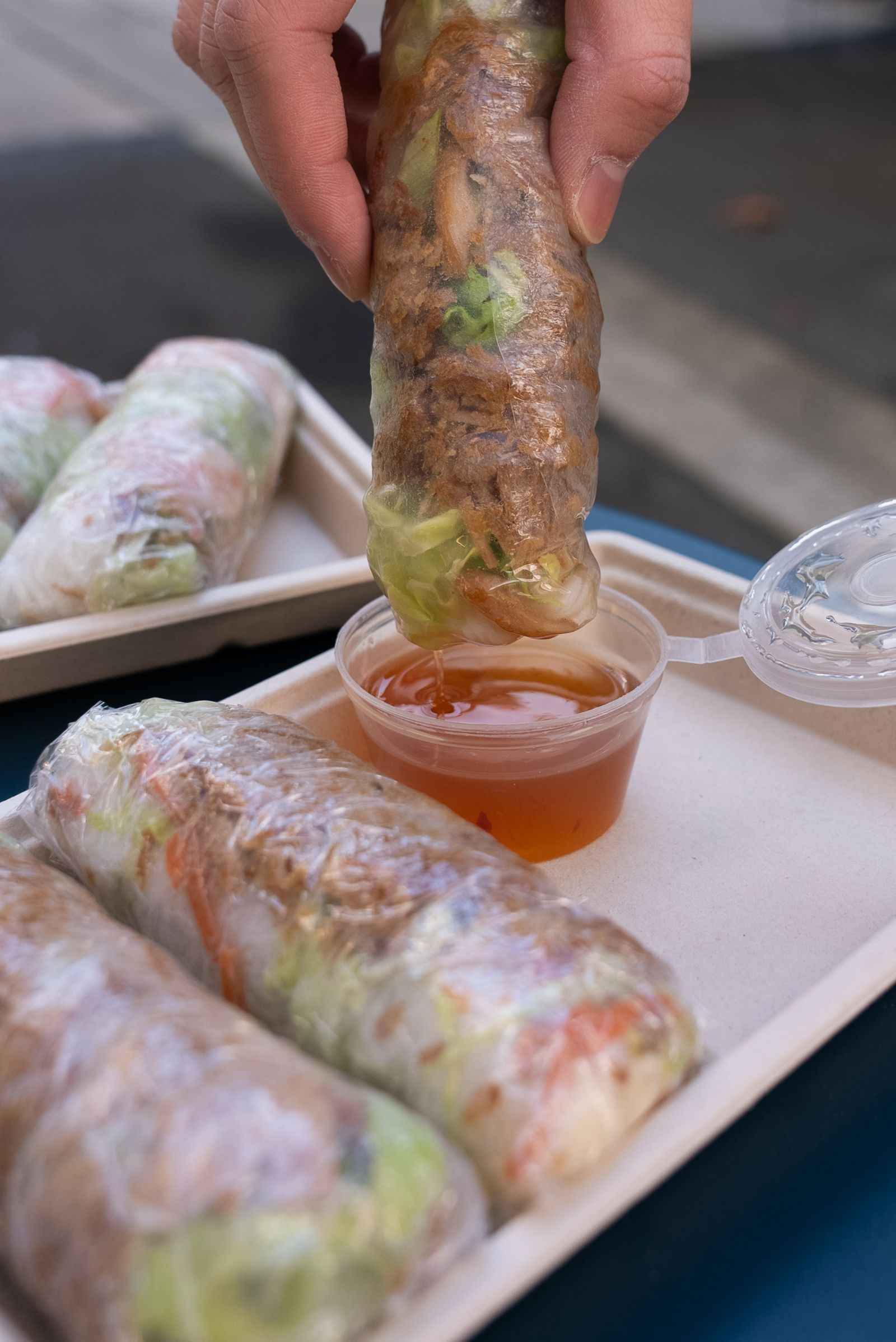 Vietnamese iced coffee and a pastry on a round table