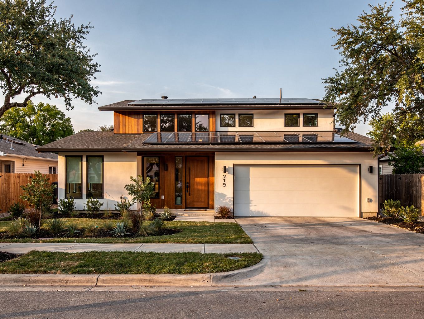 Calculator, utility bill, and warm-toned tabletop still life