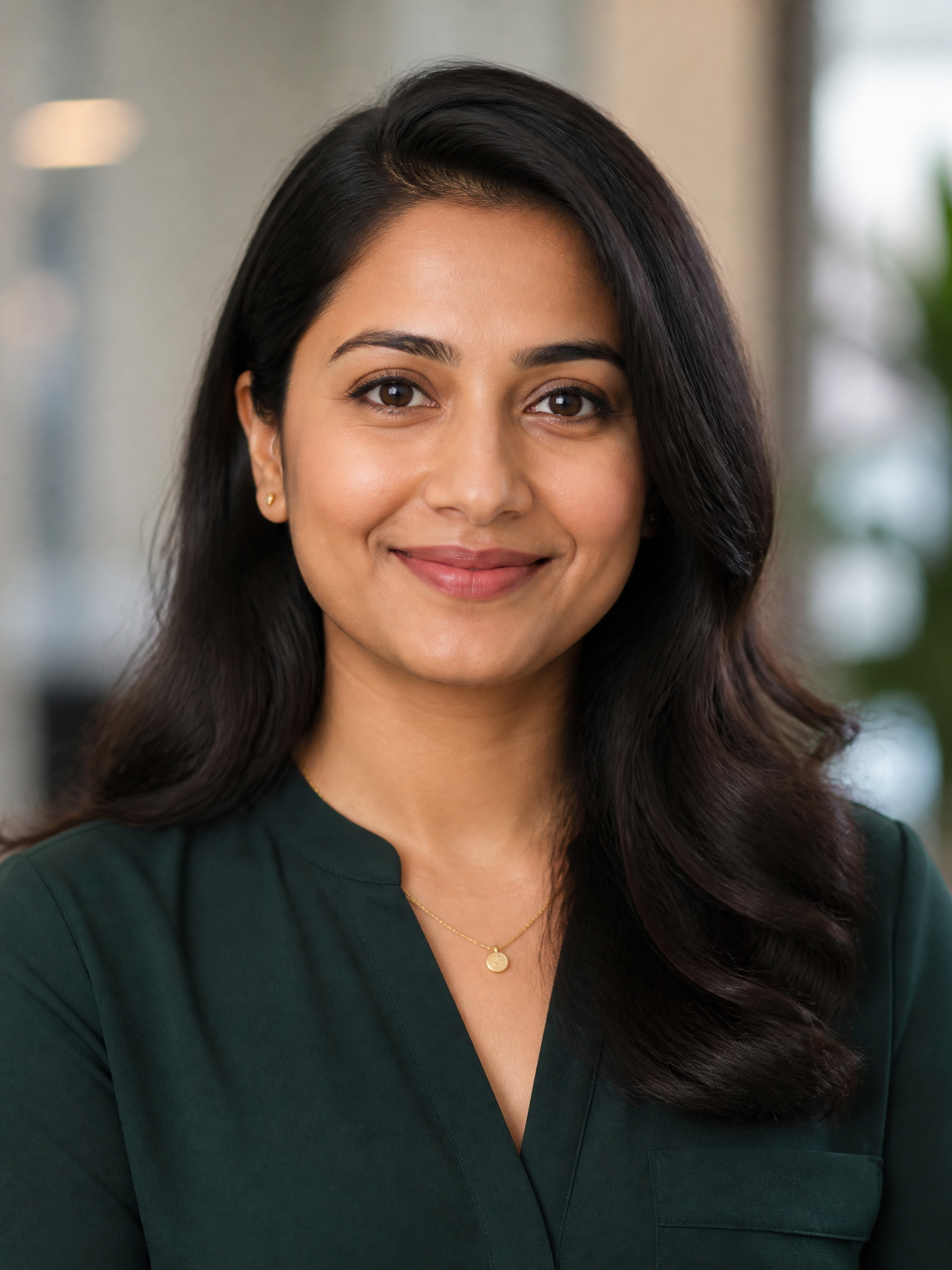 Professional Portrait of a Smiling South Asian Woman