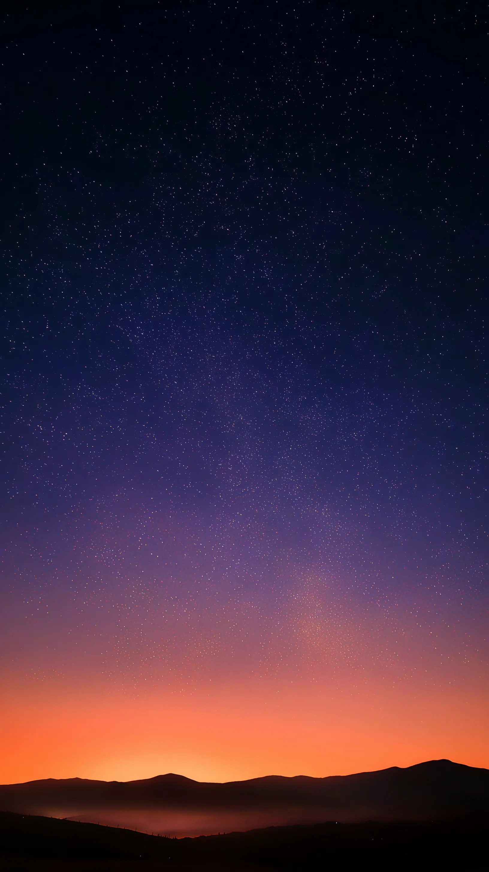 Starry Dawn Above Mountain Silhouettes