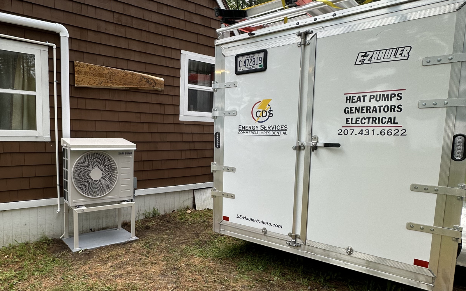 Ductless heat pump outdoor unit installed on a Maine home by CDS Energy Services — licensed electrician