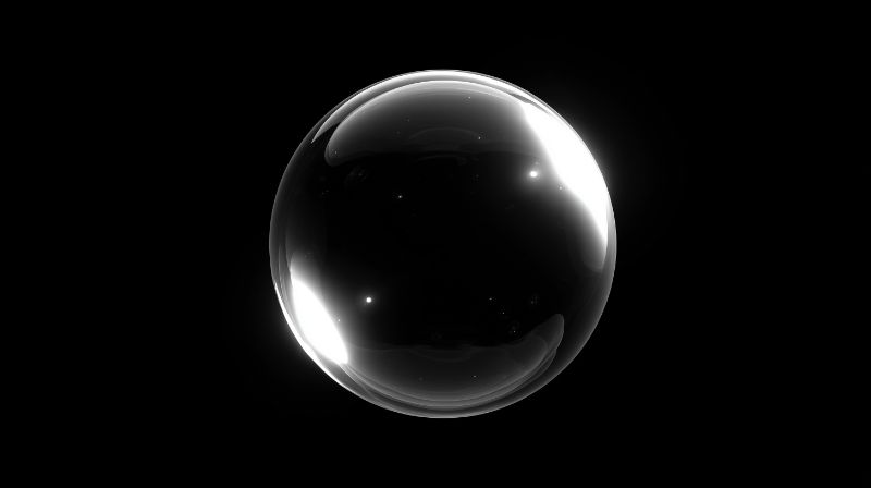 Single Reflective Bubble on Black Background