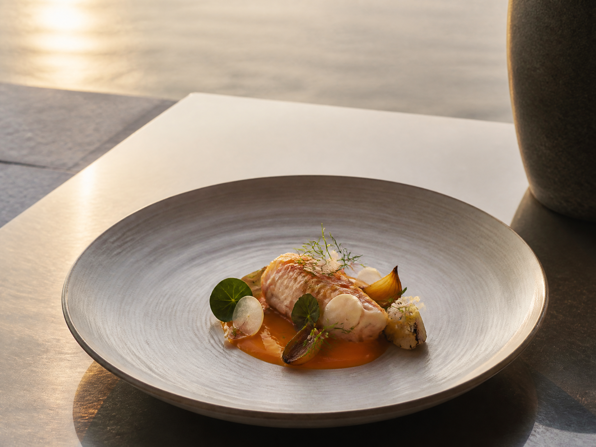 Gourmet Seafood Dish at Sunset
