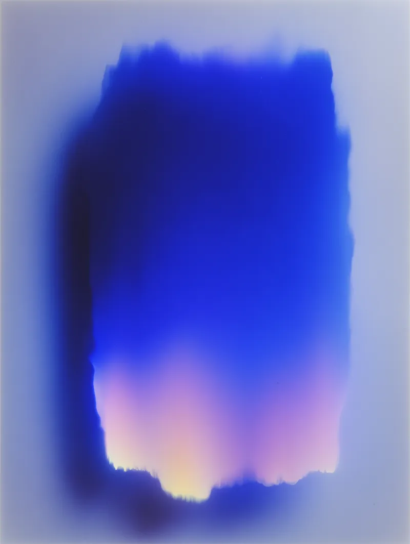 Abstract blue gradient glow on misty backdrop
