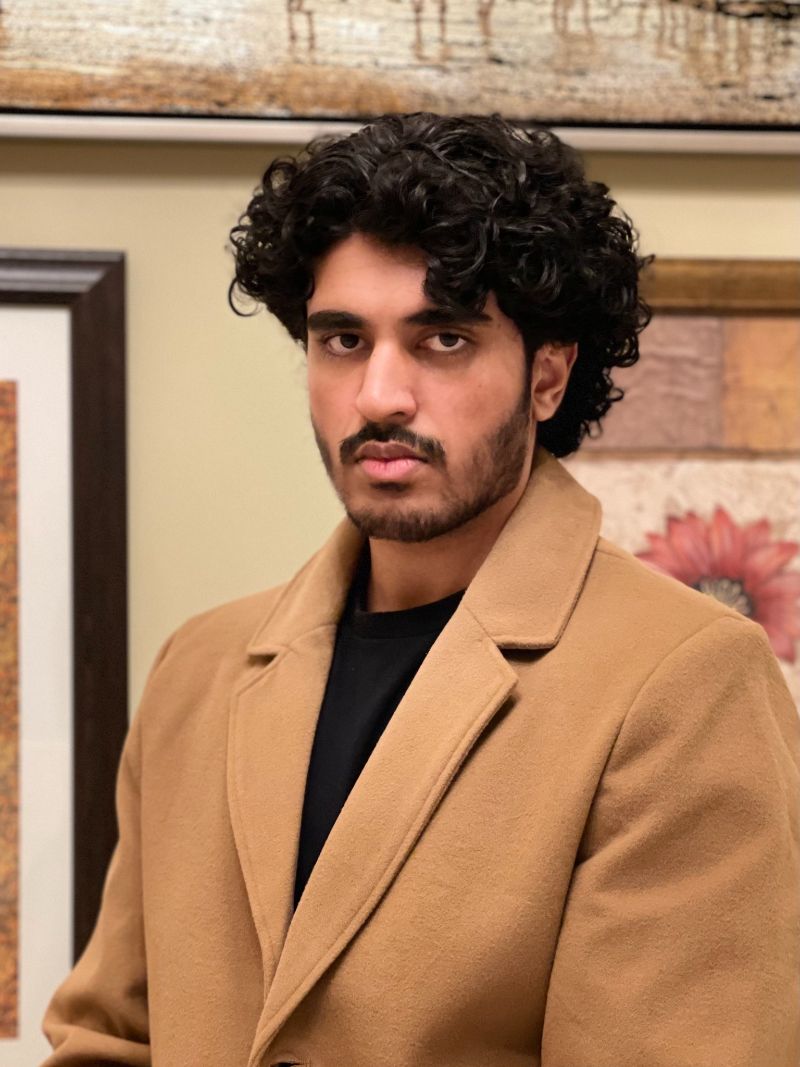 Portrait of a Young Man in a Camel Overcoat
