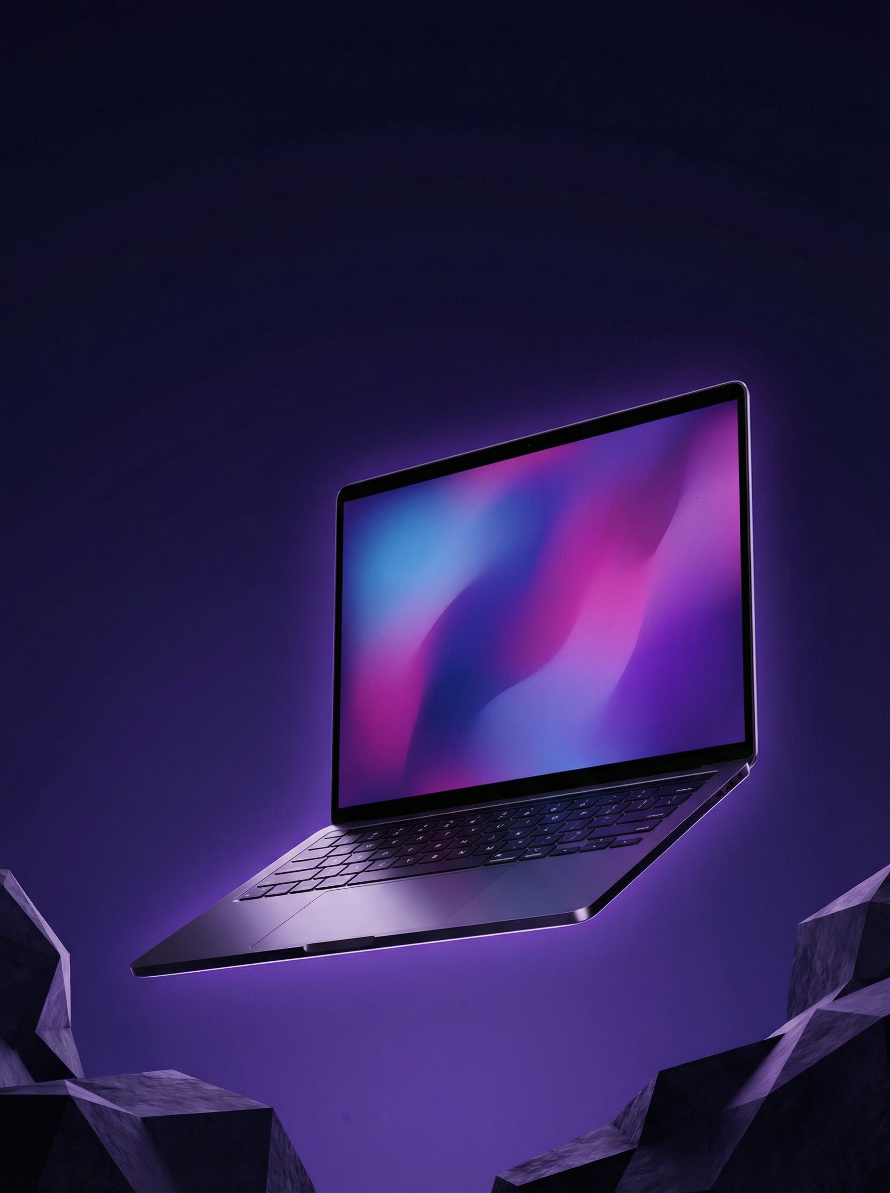 Floating laptop with neon gradient screen
