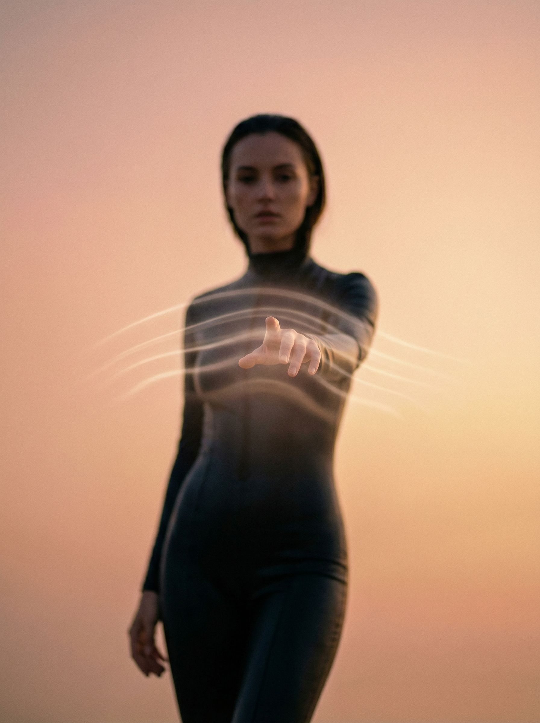 Futuristic woman touching invisible interface