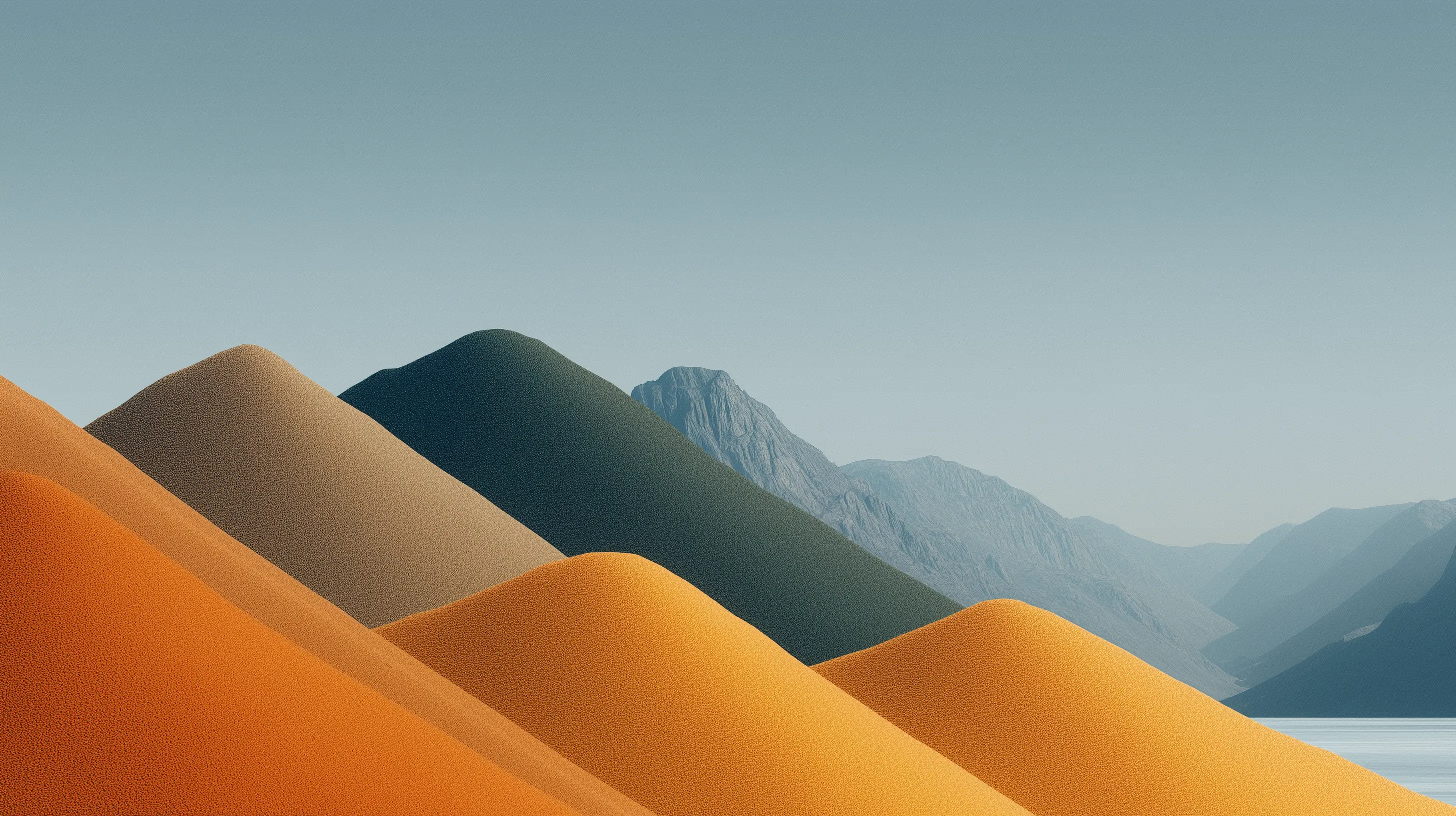 Minimal desert dunes with distant mountains