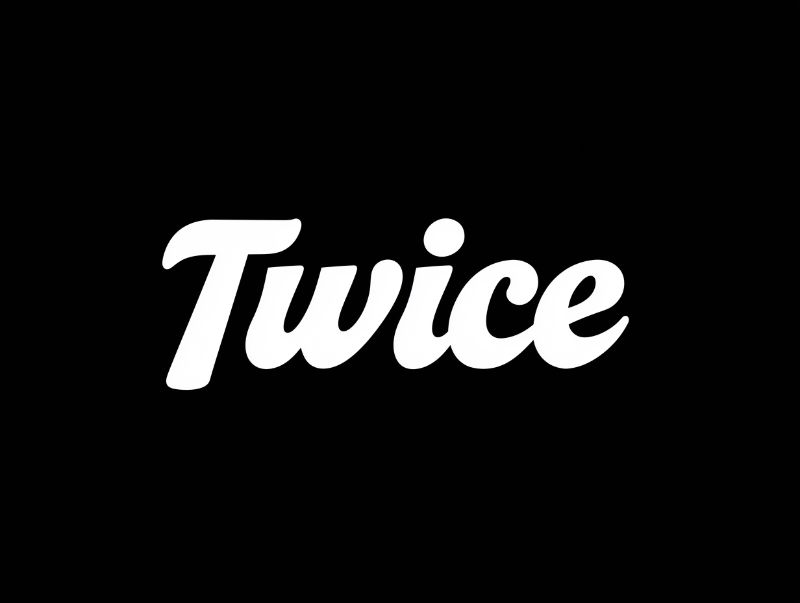White script “Twice” on black background