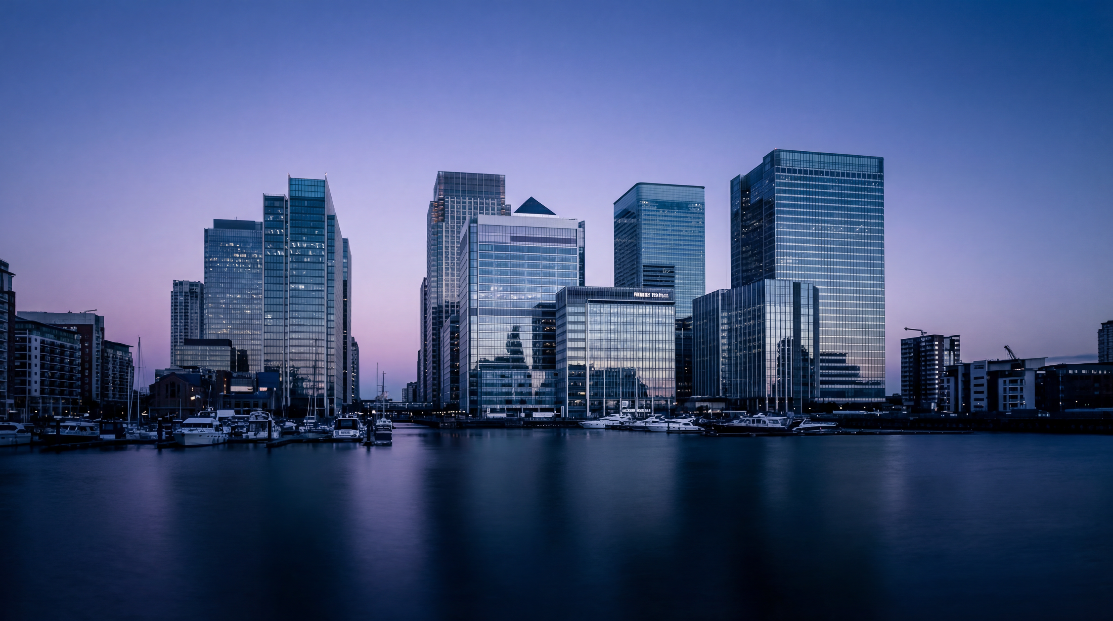 Modern waterfront city skyline at dusk