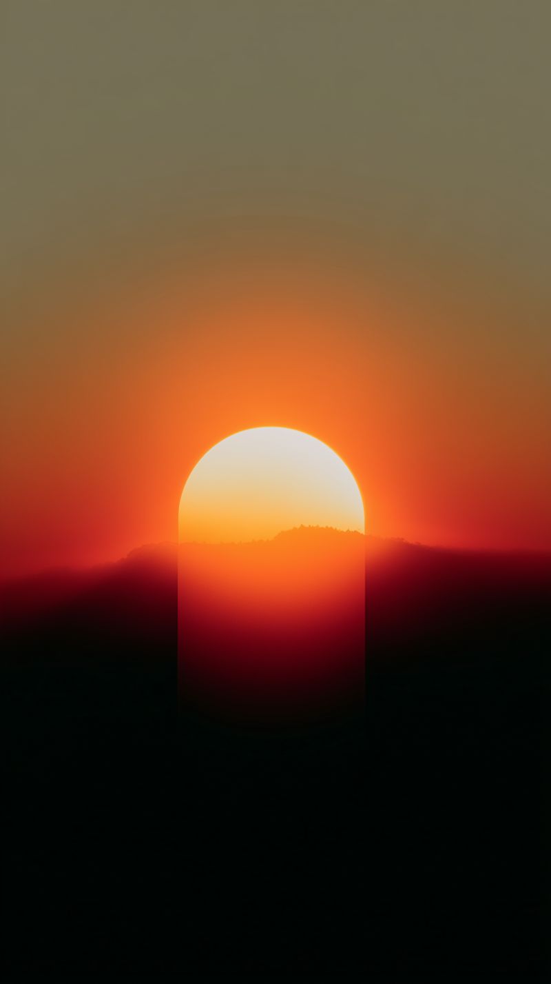 Abstract sunrise gradient over dark mountains