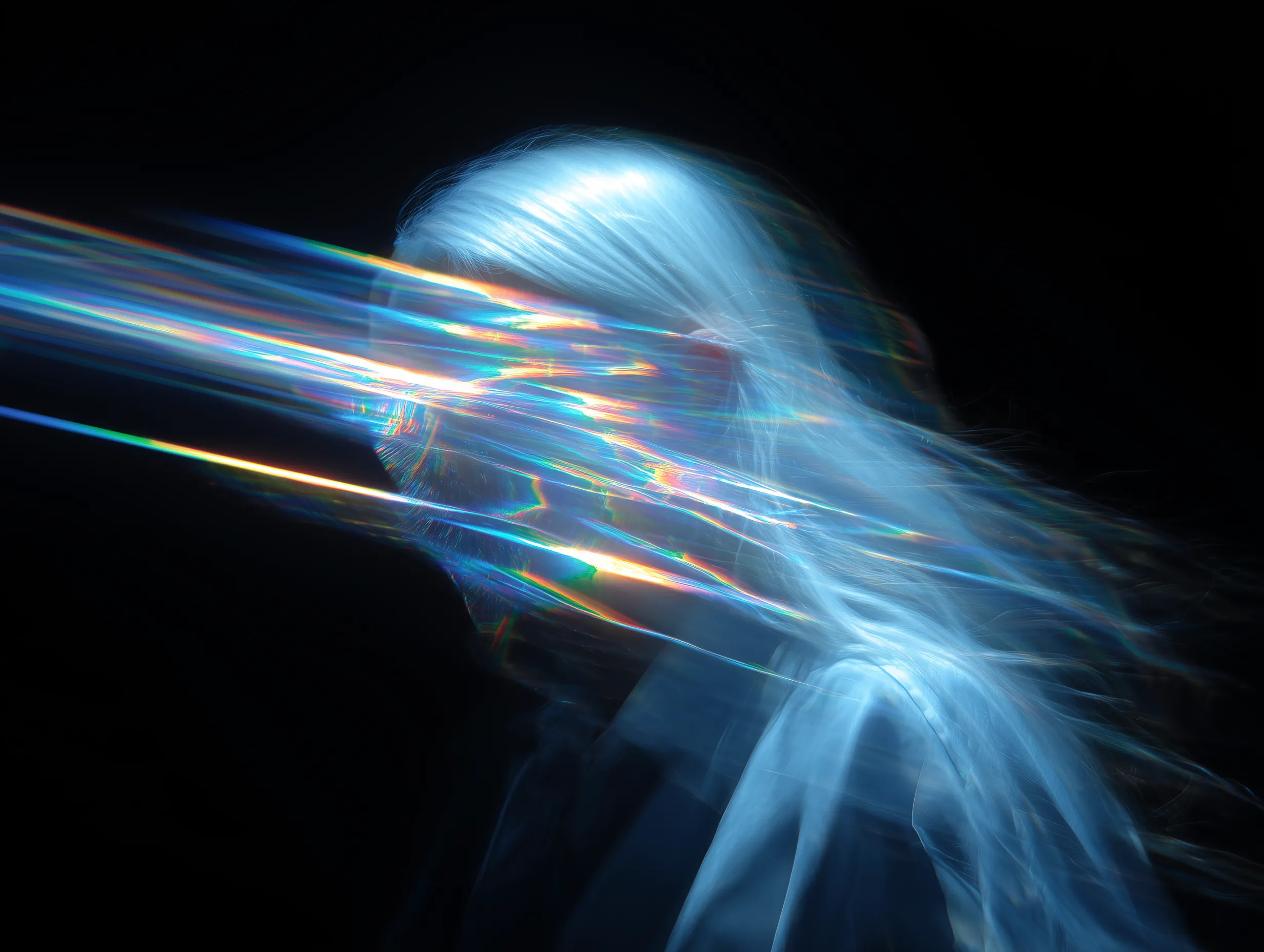 Abstract portrait with prismatic light streaks