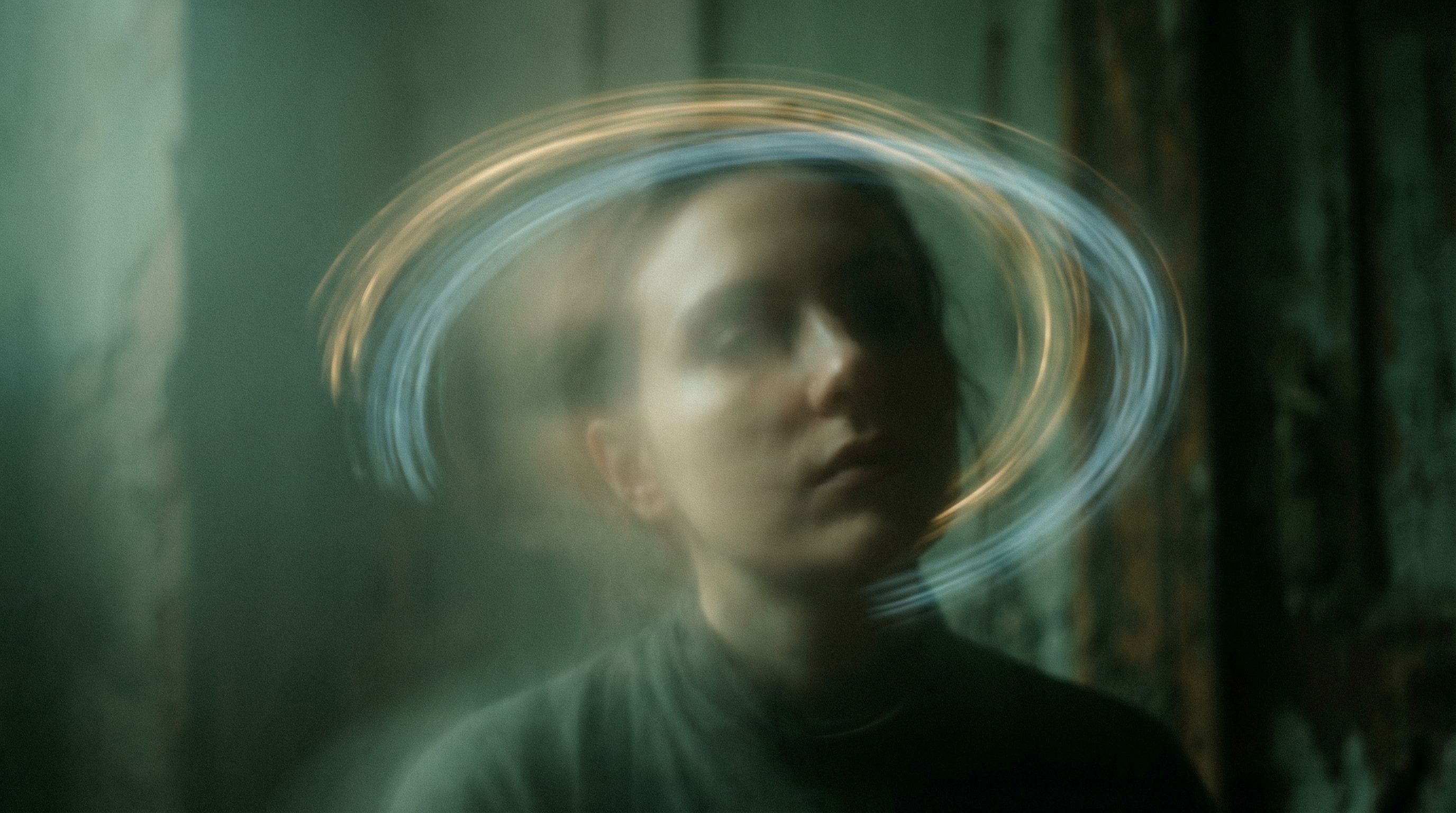 Abstract portrait with swirling light halo