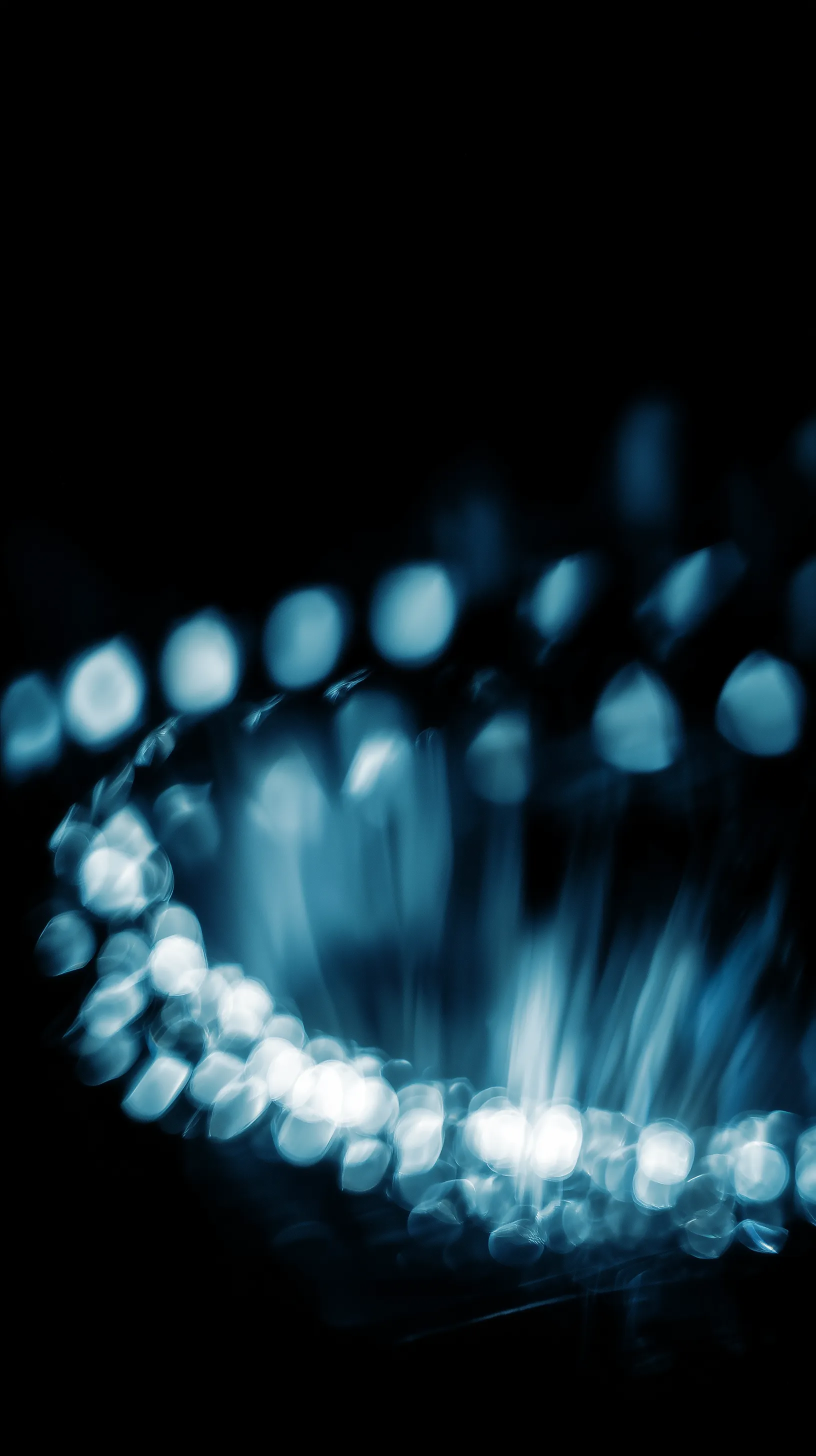 Abstract Blue Bokeh Light Arcs