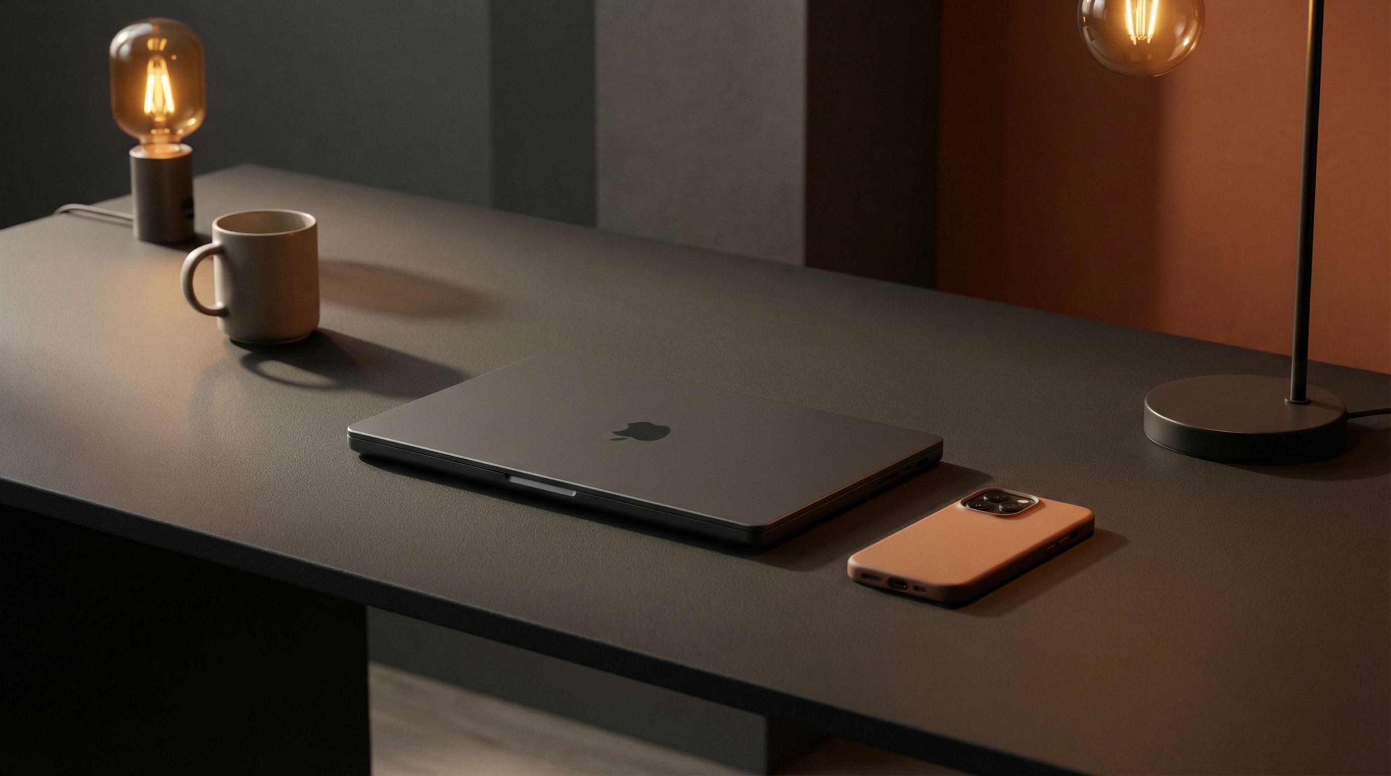 Minimalist workspace with laptop and smartphone