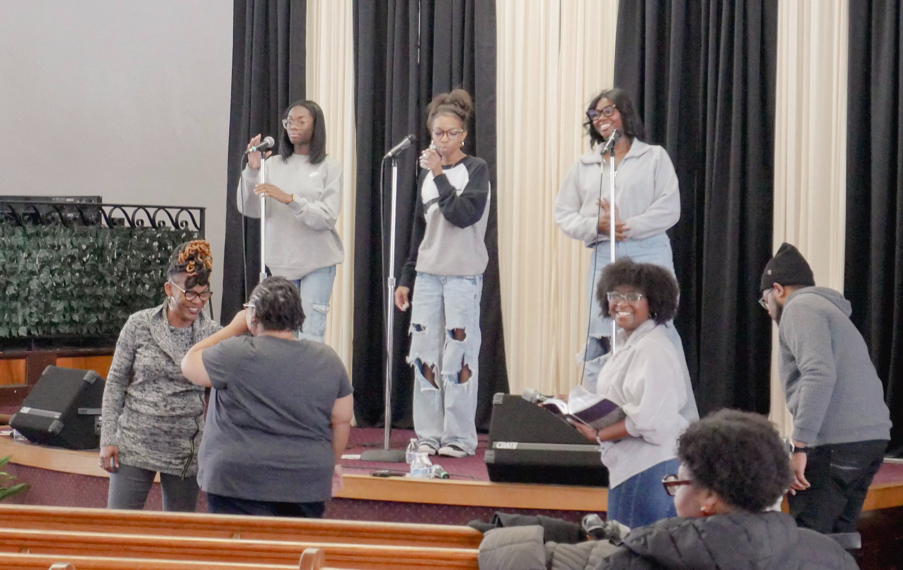 Congregation worshipping together during Sunday service