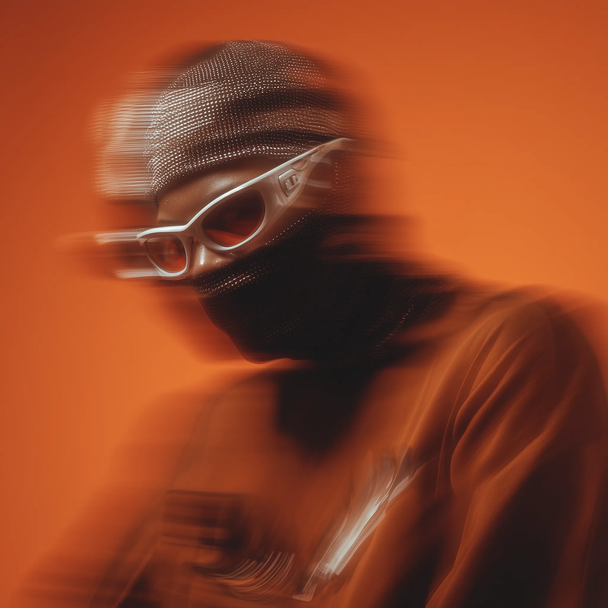 Blurred masked figure with white sunglasses
