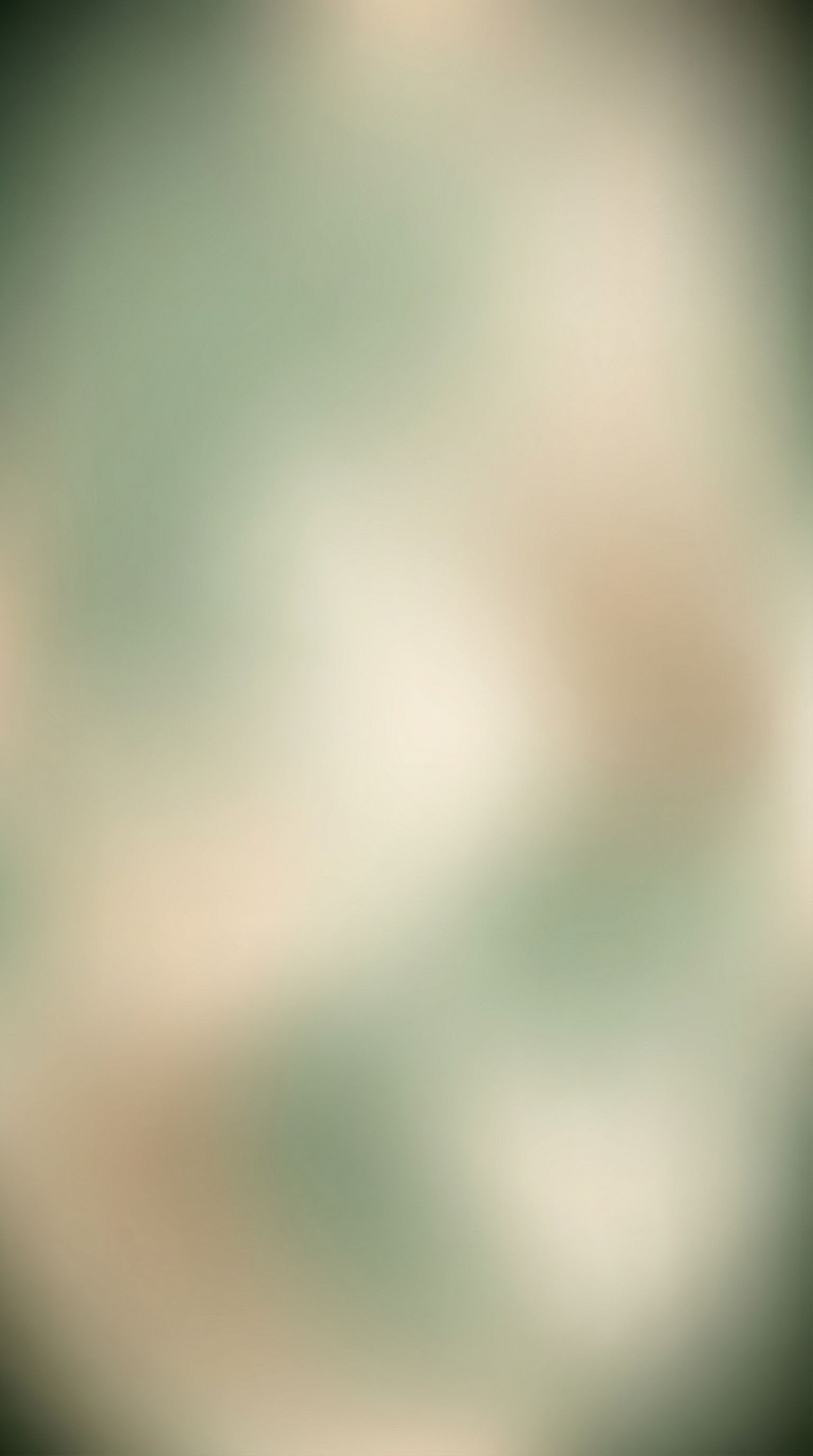Soft Green and Beige Abstract Blur Background