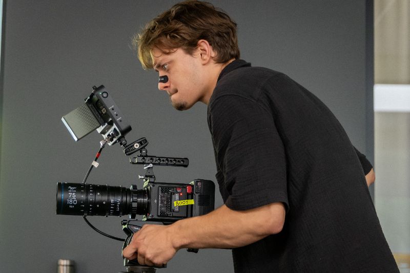 Cinematographer operating camera