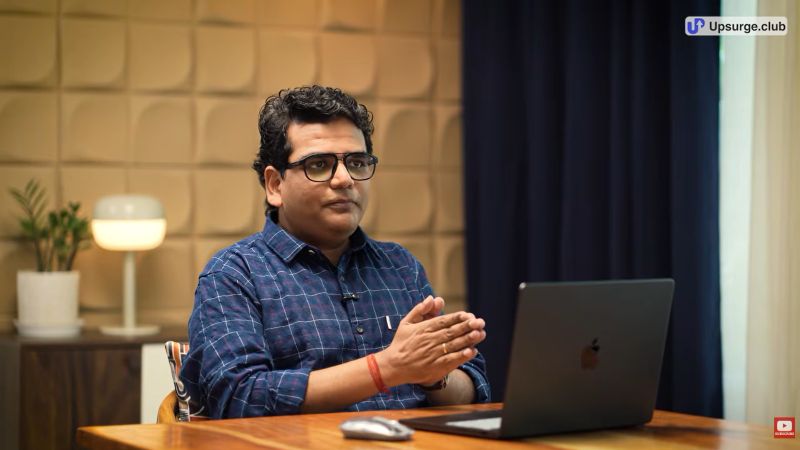 Professional Presenter at Desk with Laptop