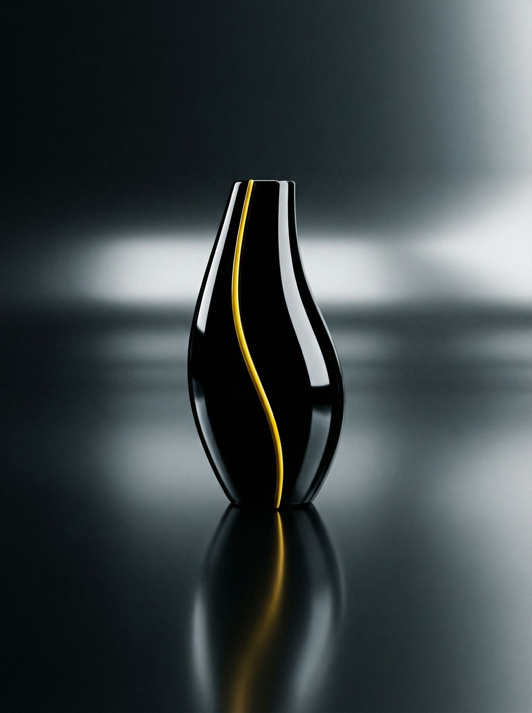 Black modern vase with yellow accent line
