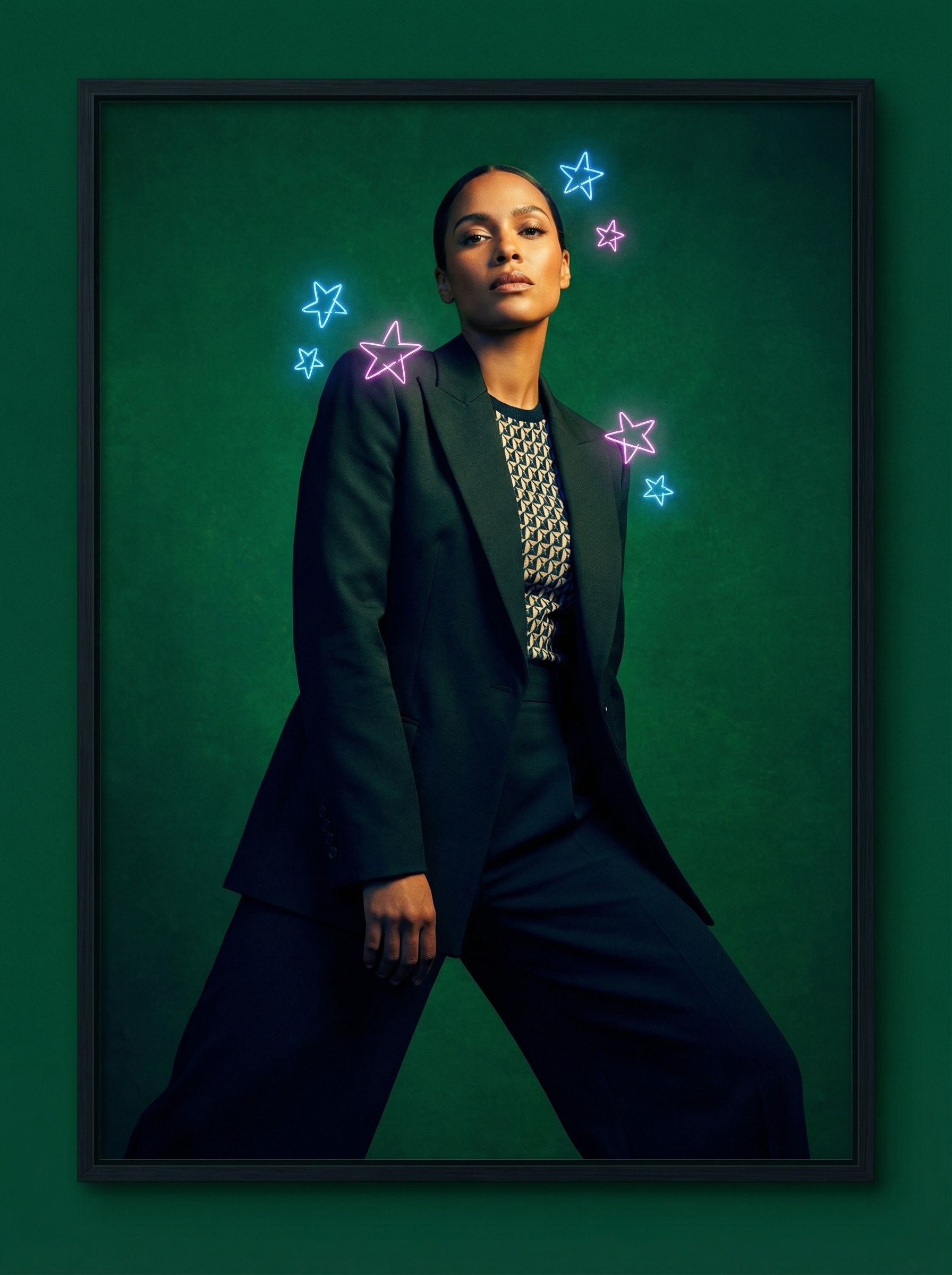 Confident woman in suit with neon star accents