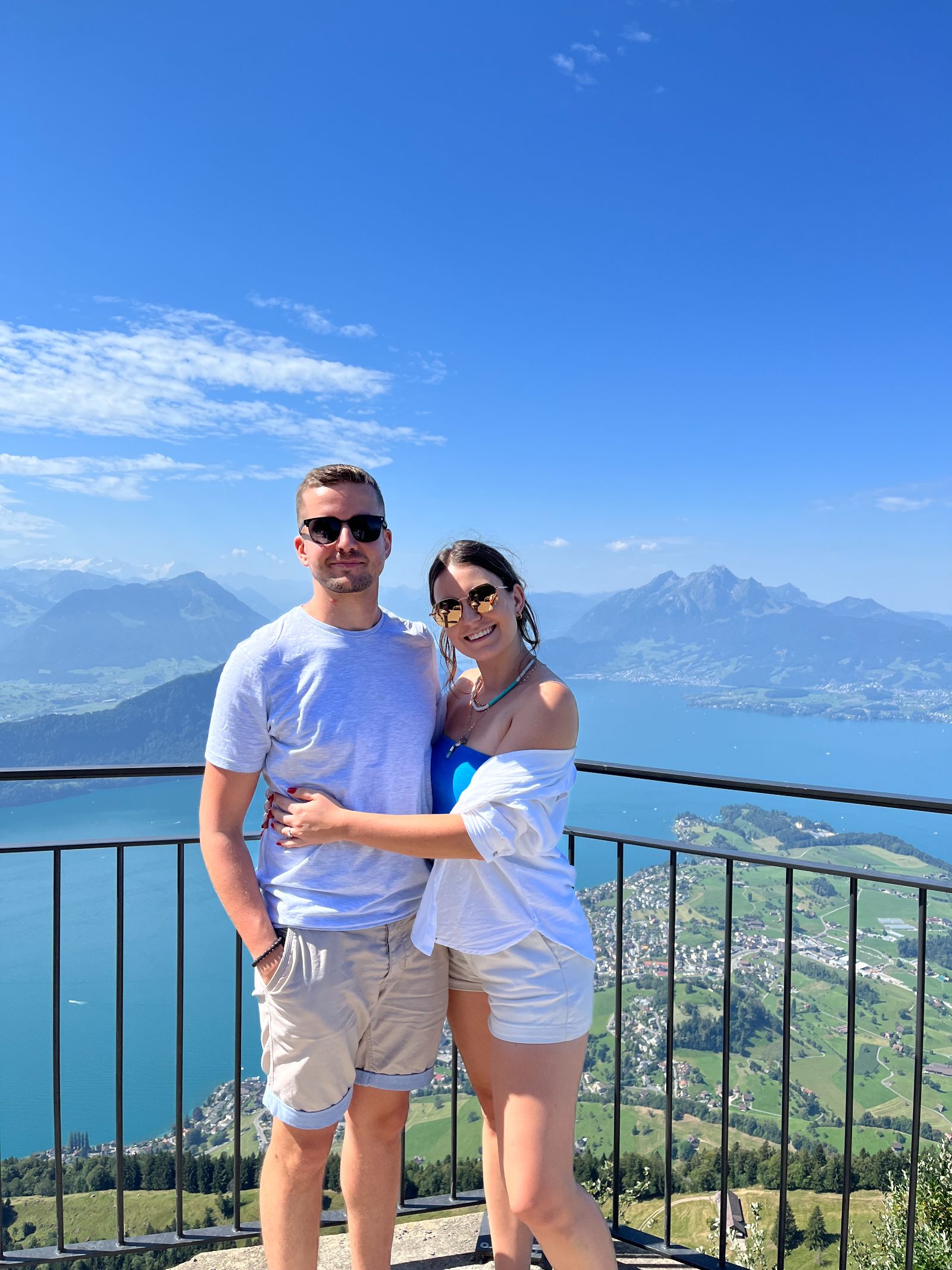 Aerial View of Couple Floating in Clear Sea