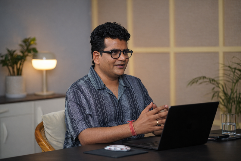 Professional Working on Laptop at Home Office