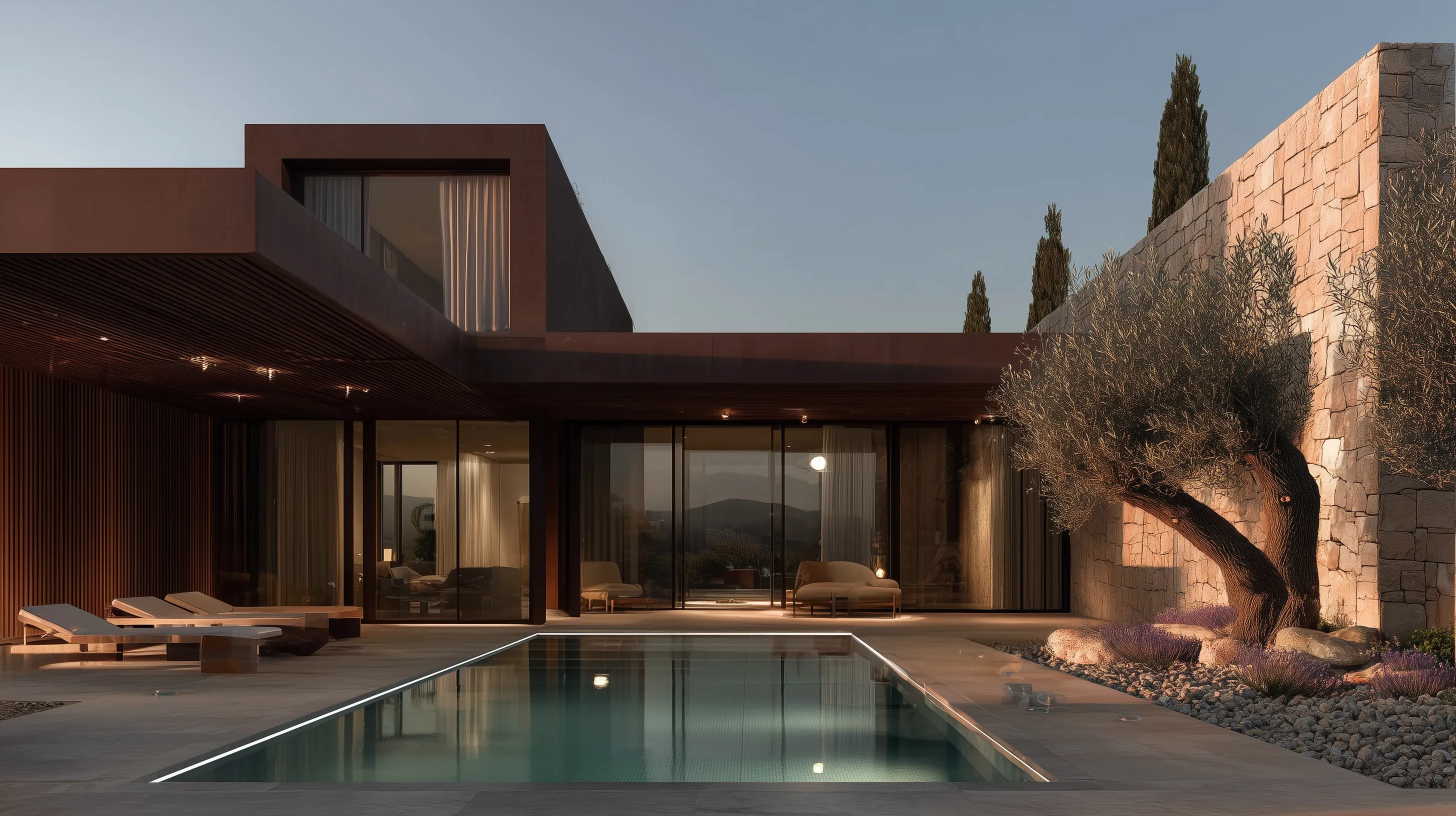 Modern luxury villa with pool at sunset