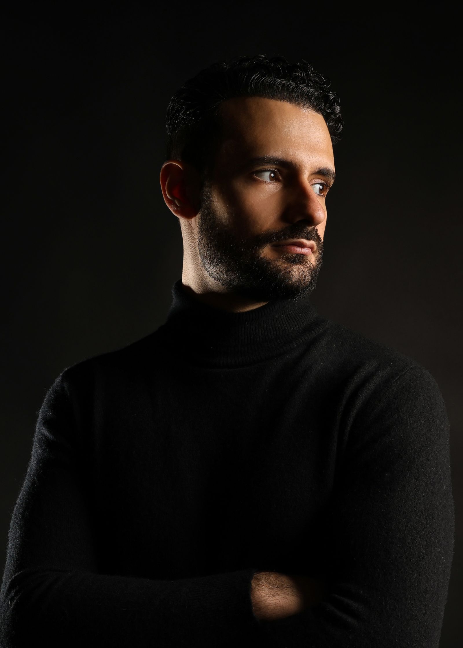 Moody Portrait of a Man in Black Turtleneck