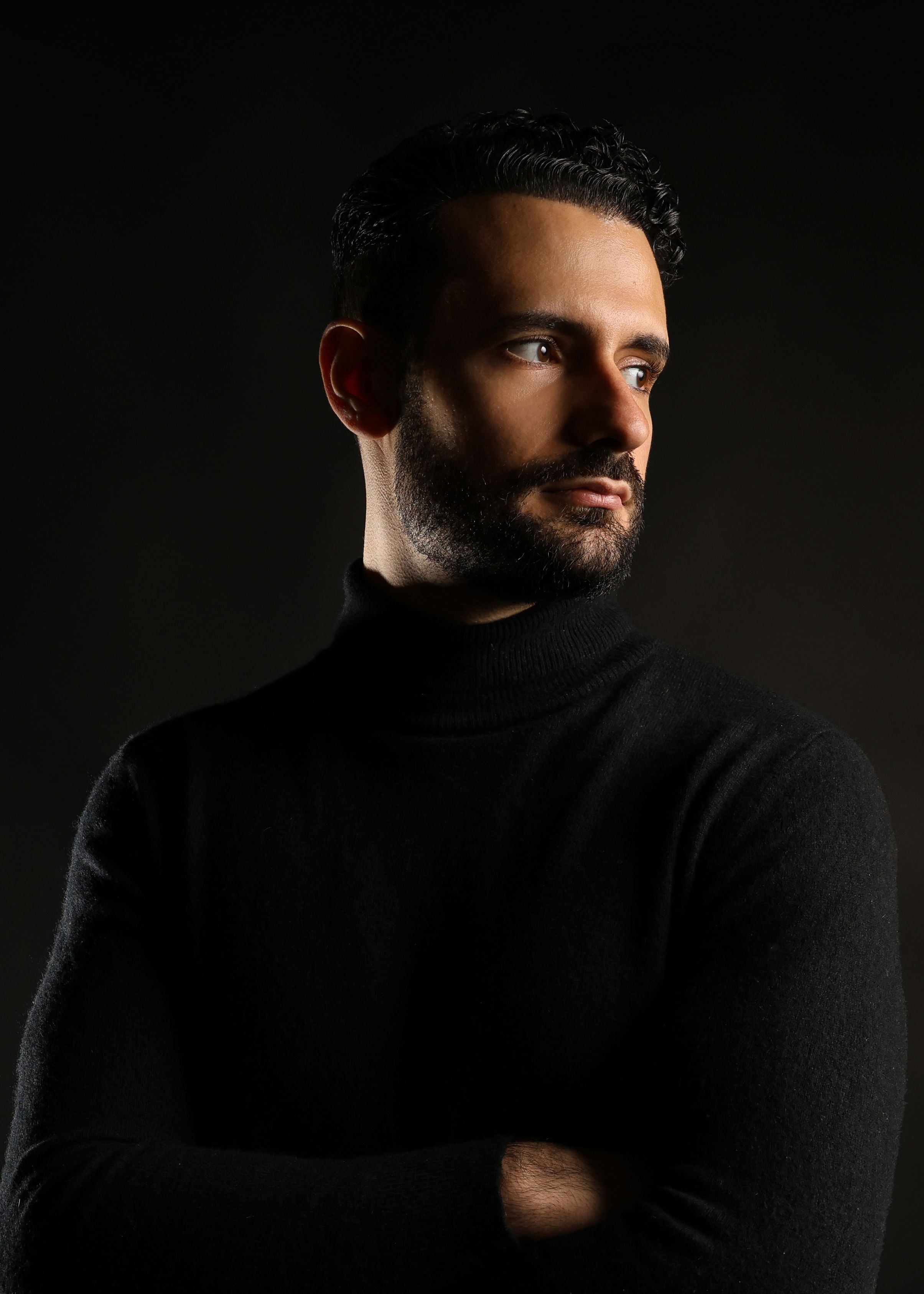 Moody Portrait of a Man in Black Turtleneck