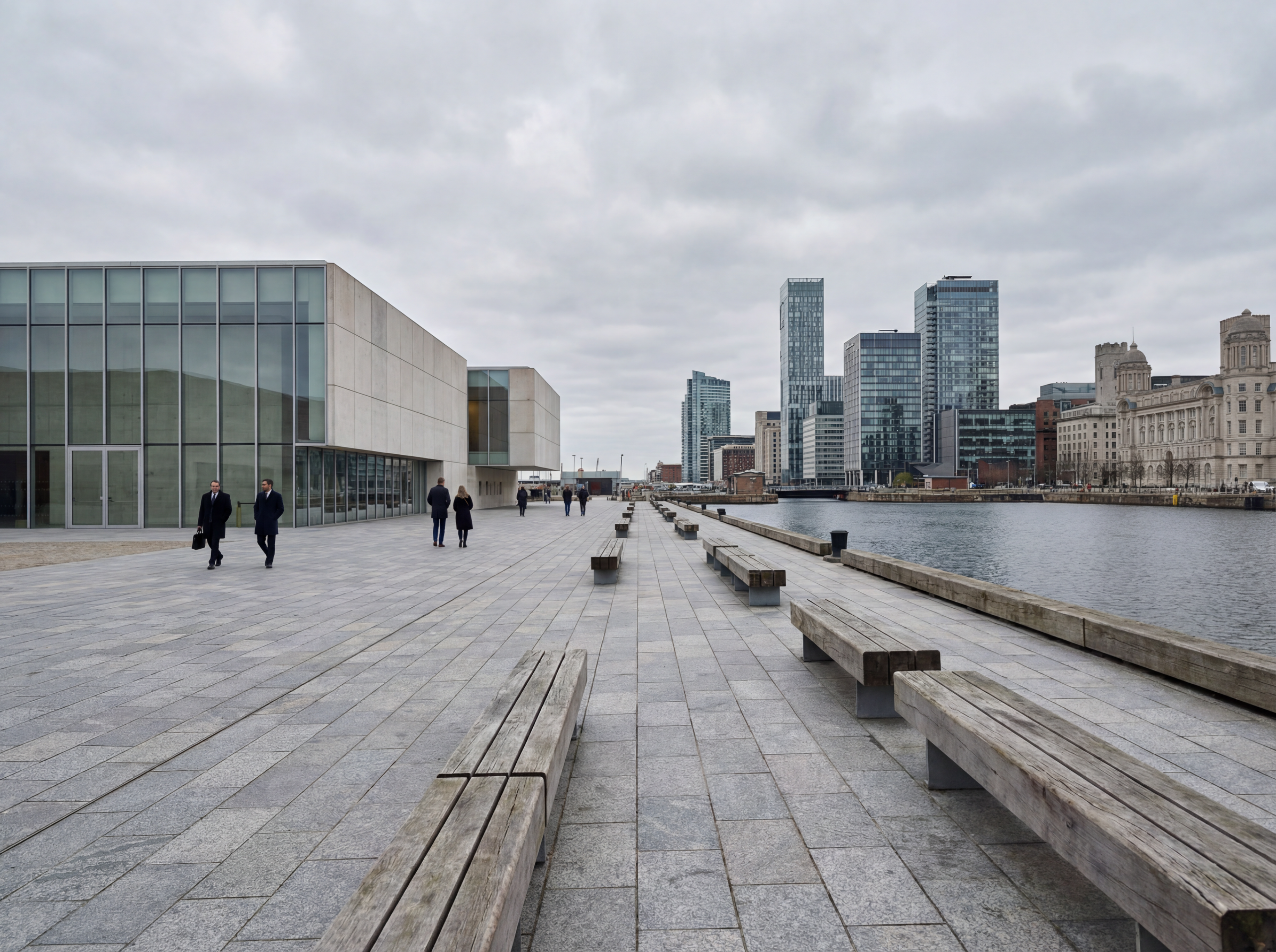 Modern waterfront promenade with city skyline