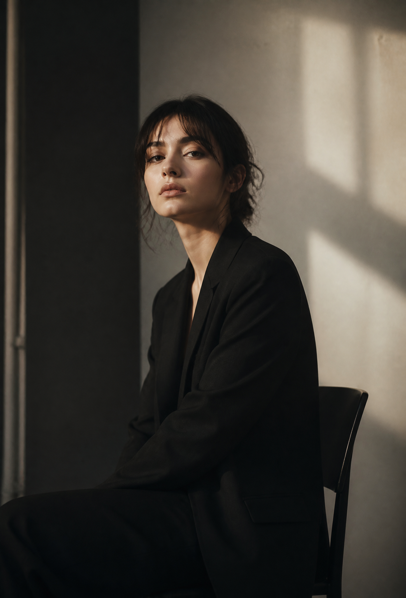 Elegant Portrait of a Woman in a Black Blazer