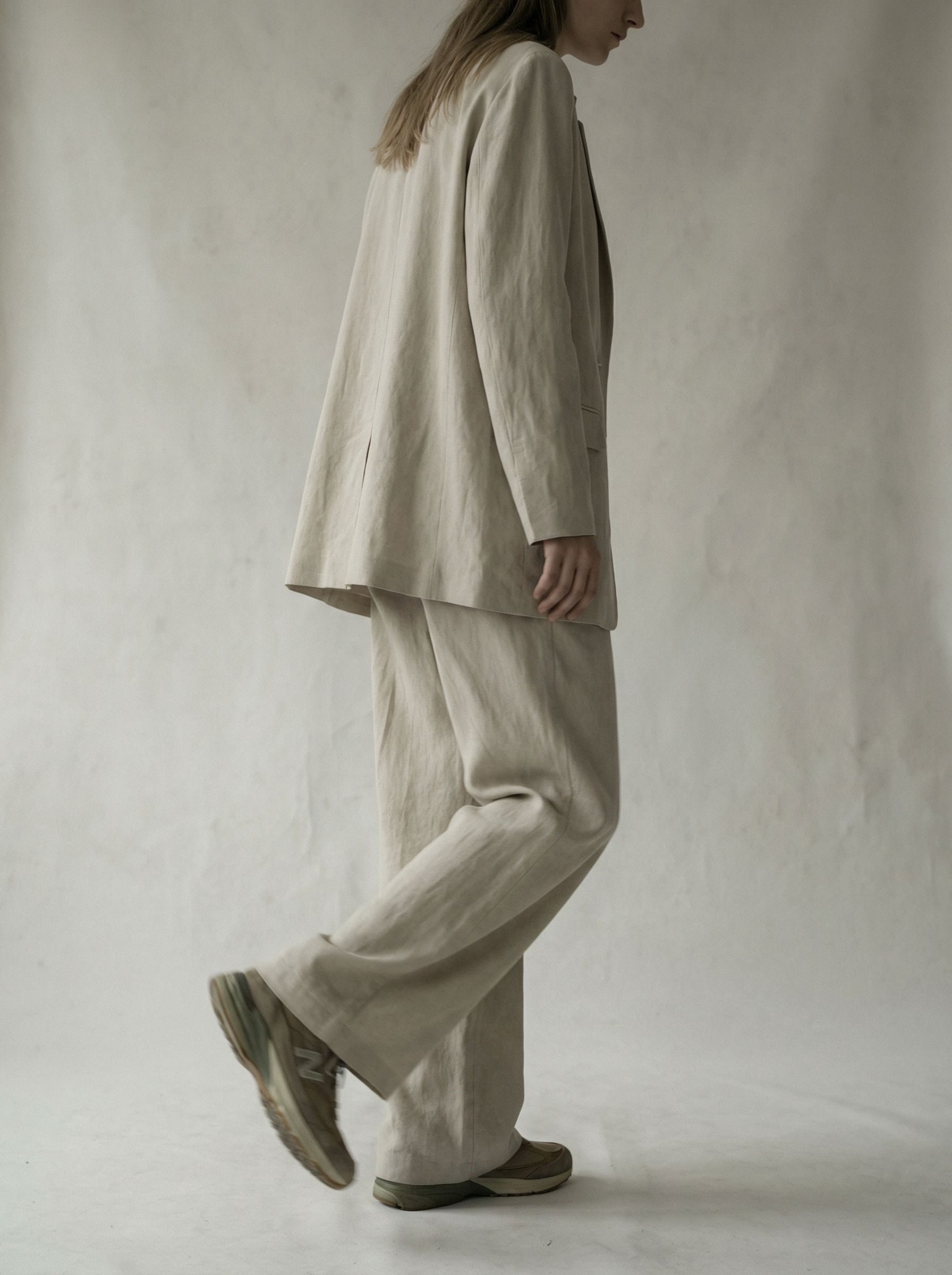 Minimalist beige suit fashion portrait
