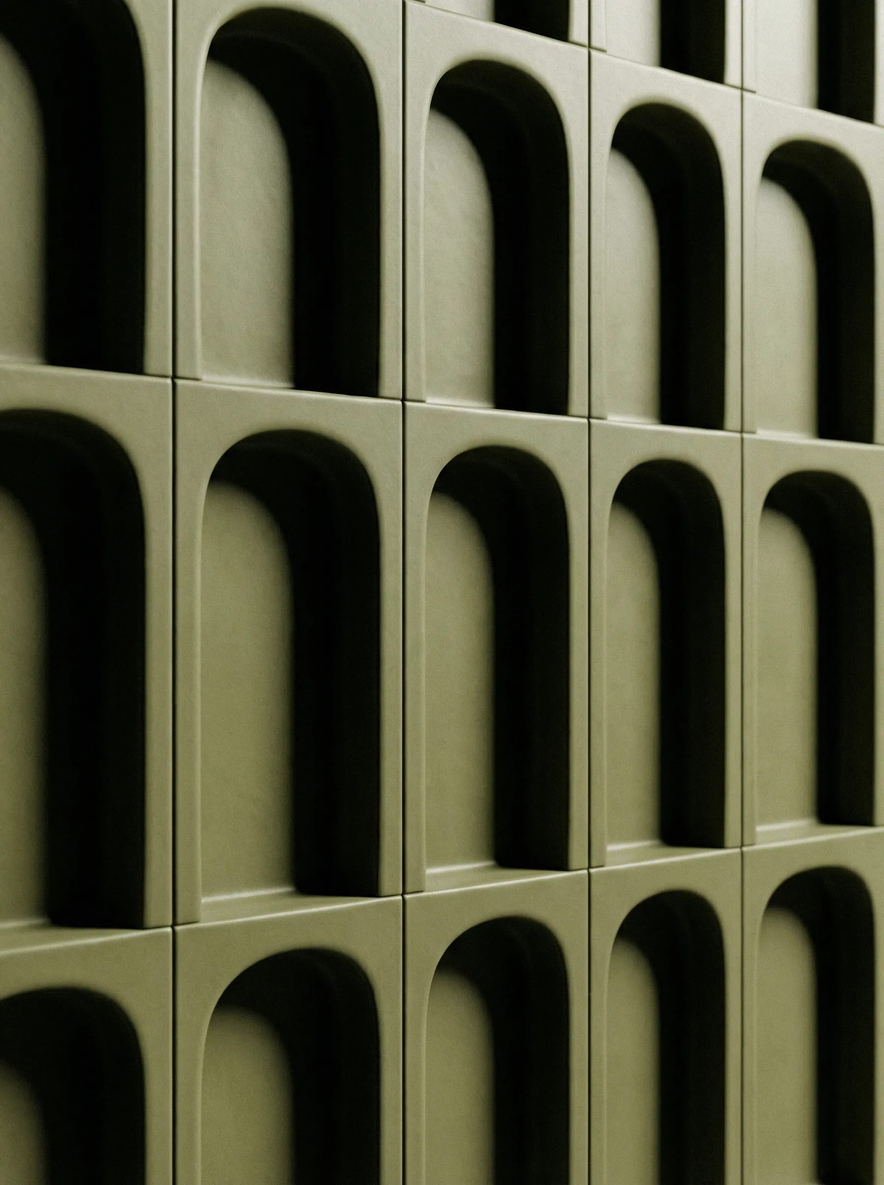 Olive green arched wall pattern