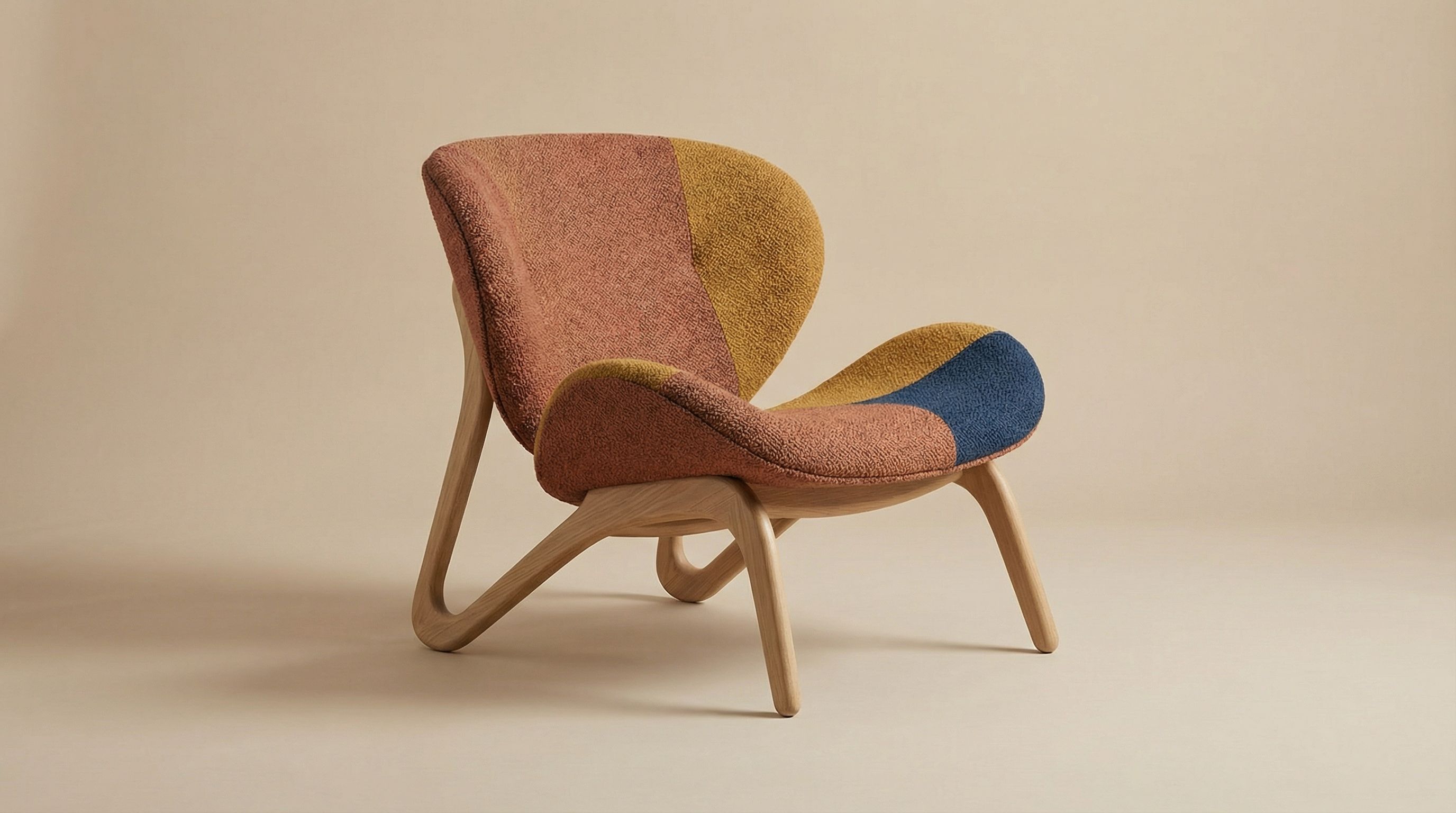Modern patchwork lounge chair on beige backdrop