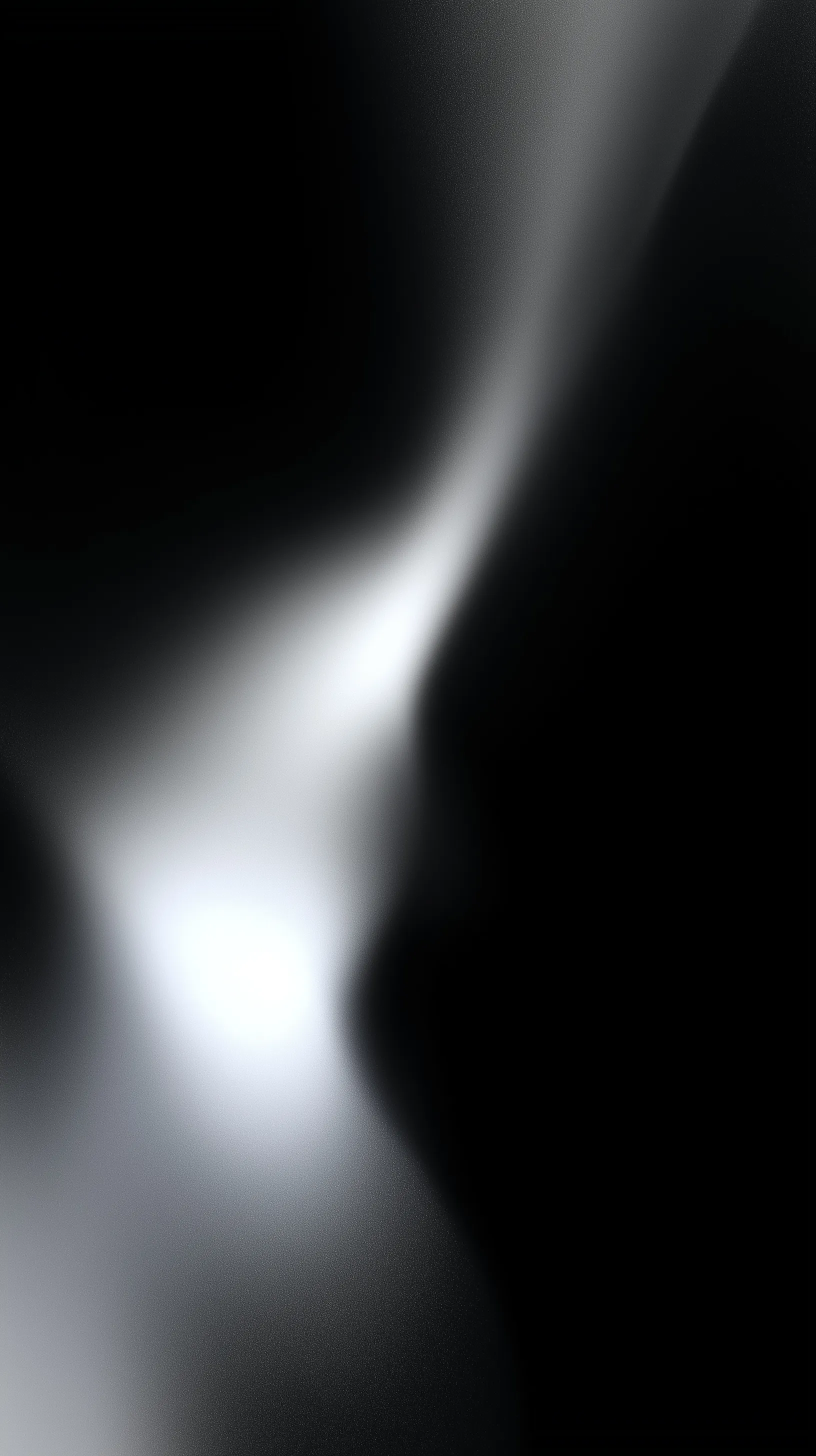 Abstract black gradient with white light streak