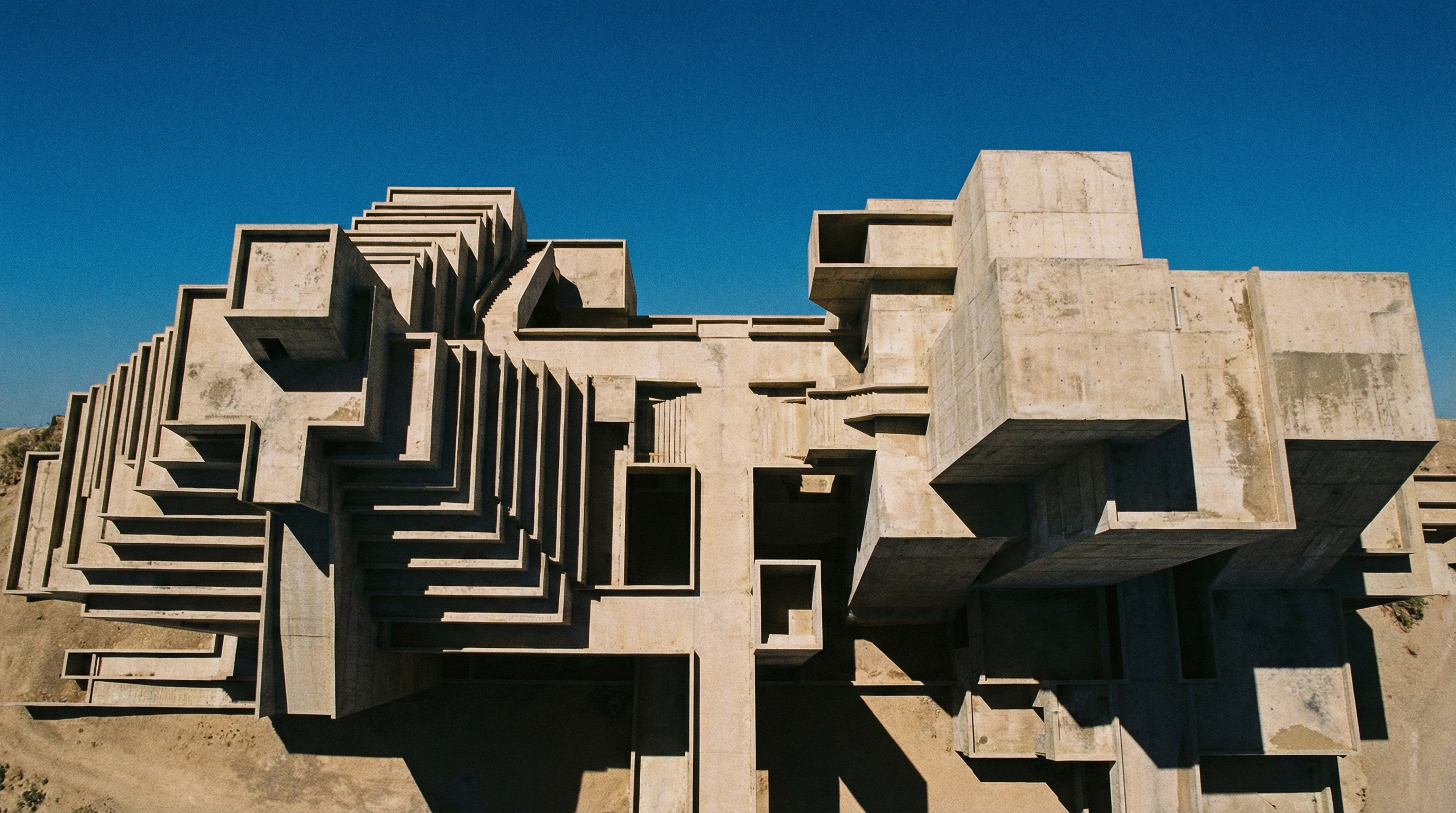 Brutalist concrete structure under clear sky