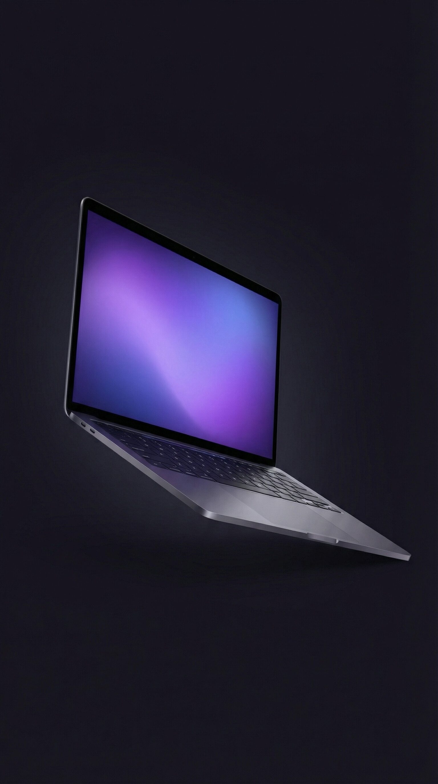 Floating laptop with gradient purple screen