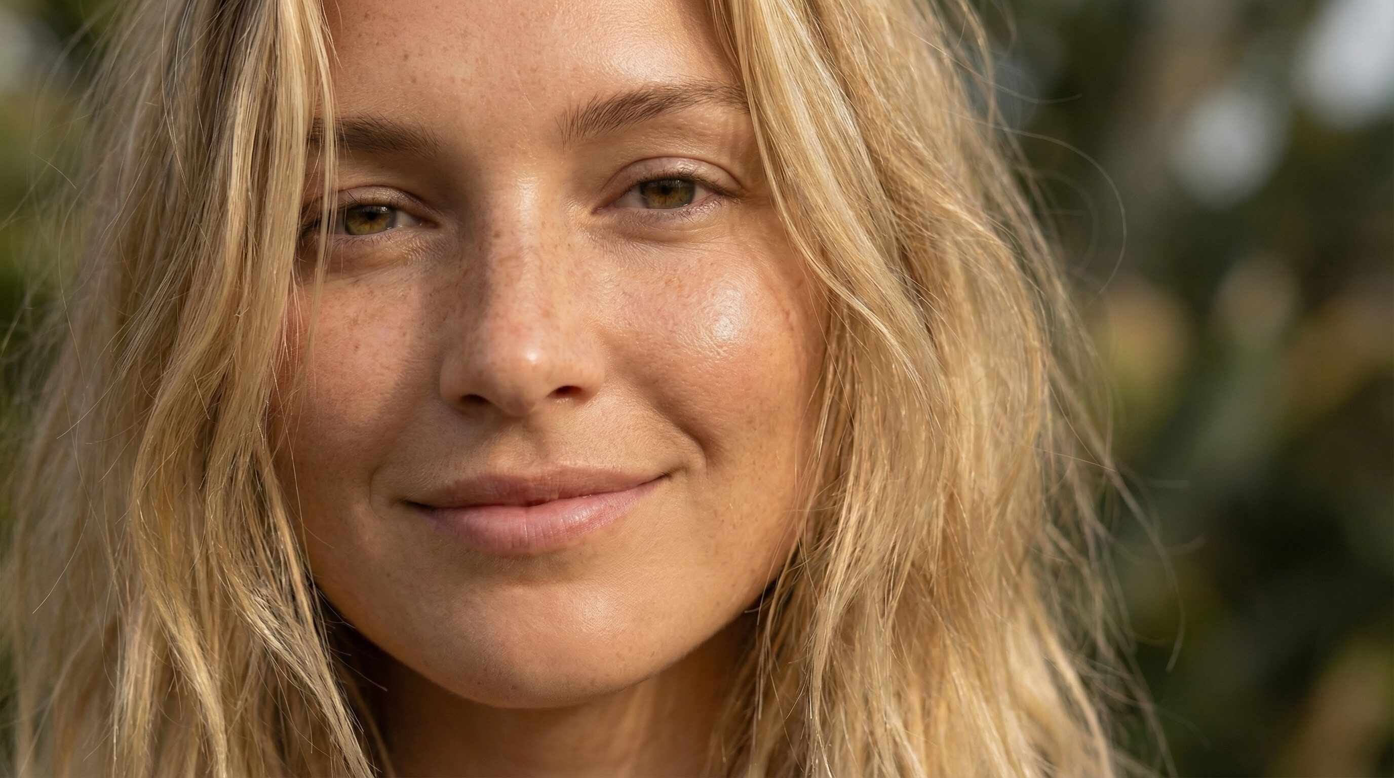 Close-up Portrait of Smiling Woman Outdoors