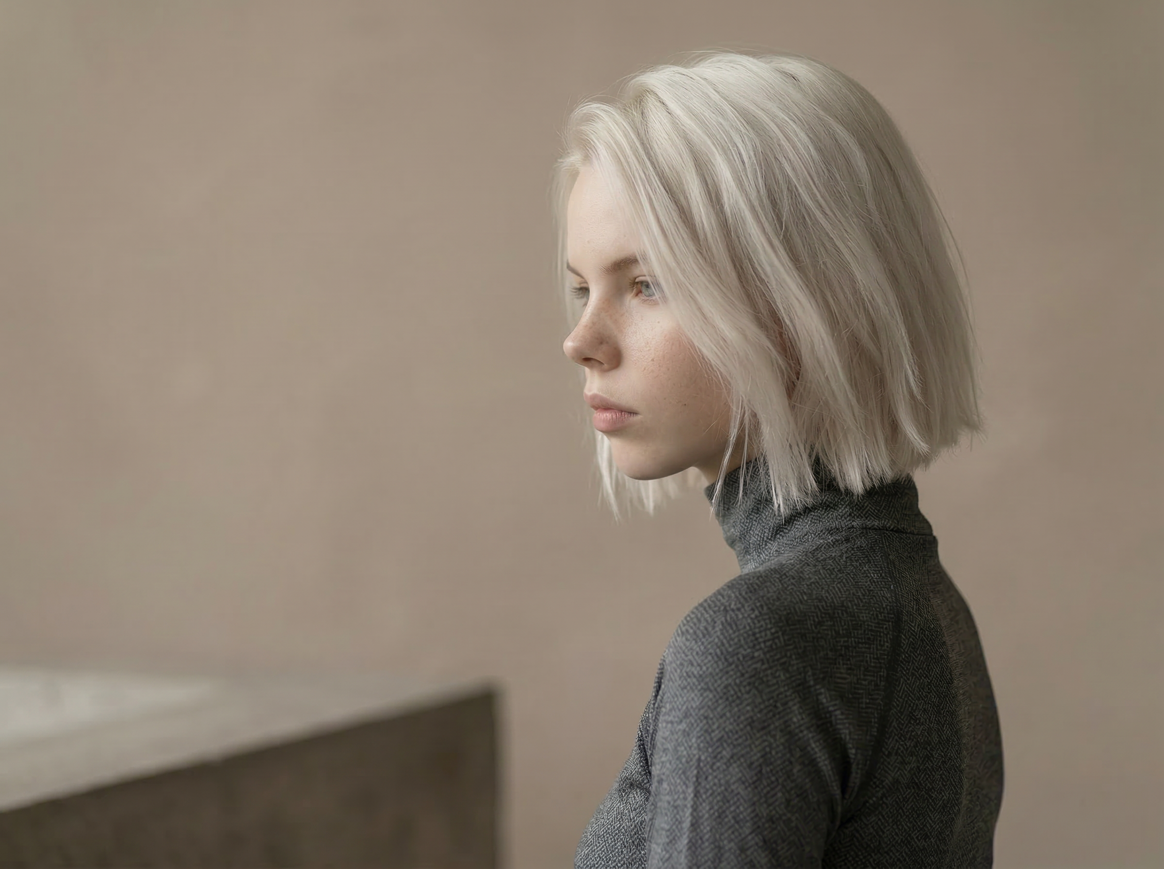 Soft light profile portrait of blonde woman