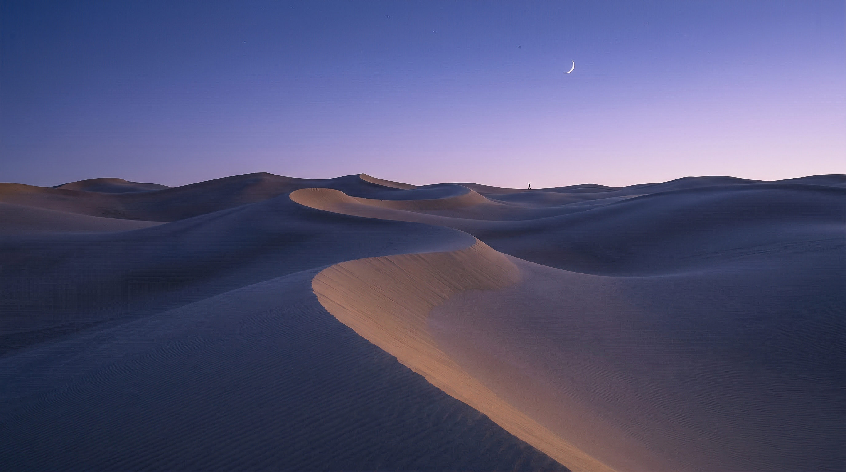 Crescent Moon Over Desert Sand Dunes at Dusk