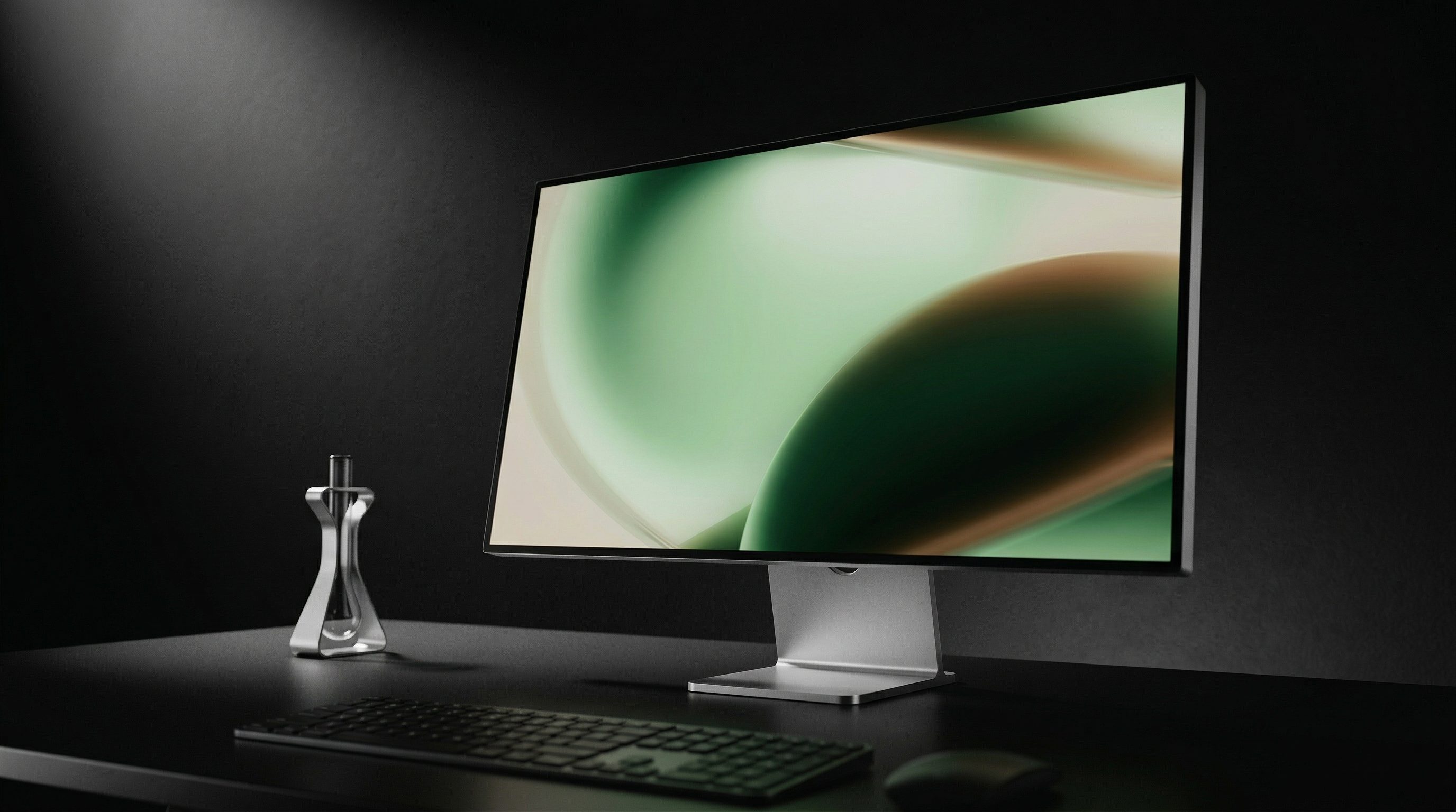 Modern desktop monitor on dark minimalist desk